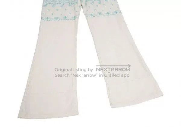 white vintage embroidered flower pants.