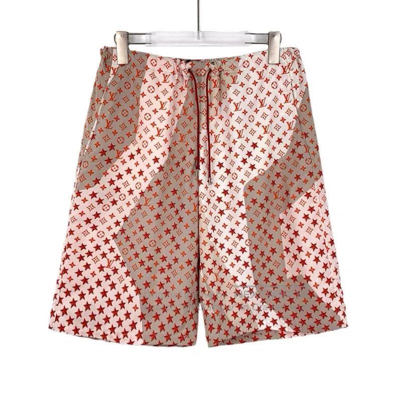 Louis Vuitton Pink Logo Star Print Shorts.