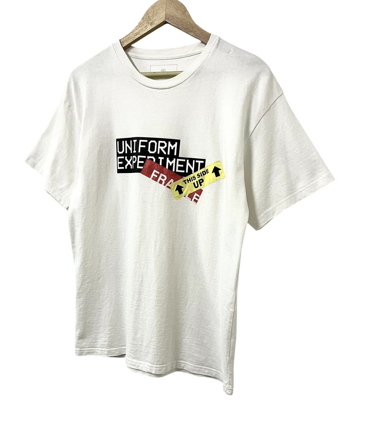 uniform experiment UNIFORM EXPERIMENT SOPHNET ATTENTION TAG JAPANESE TSHIRT Size US M / EU 48-50 / 2 - 4 Thumbnail