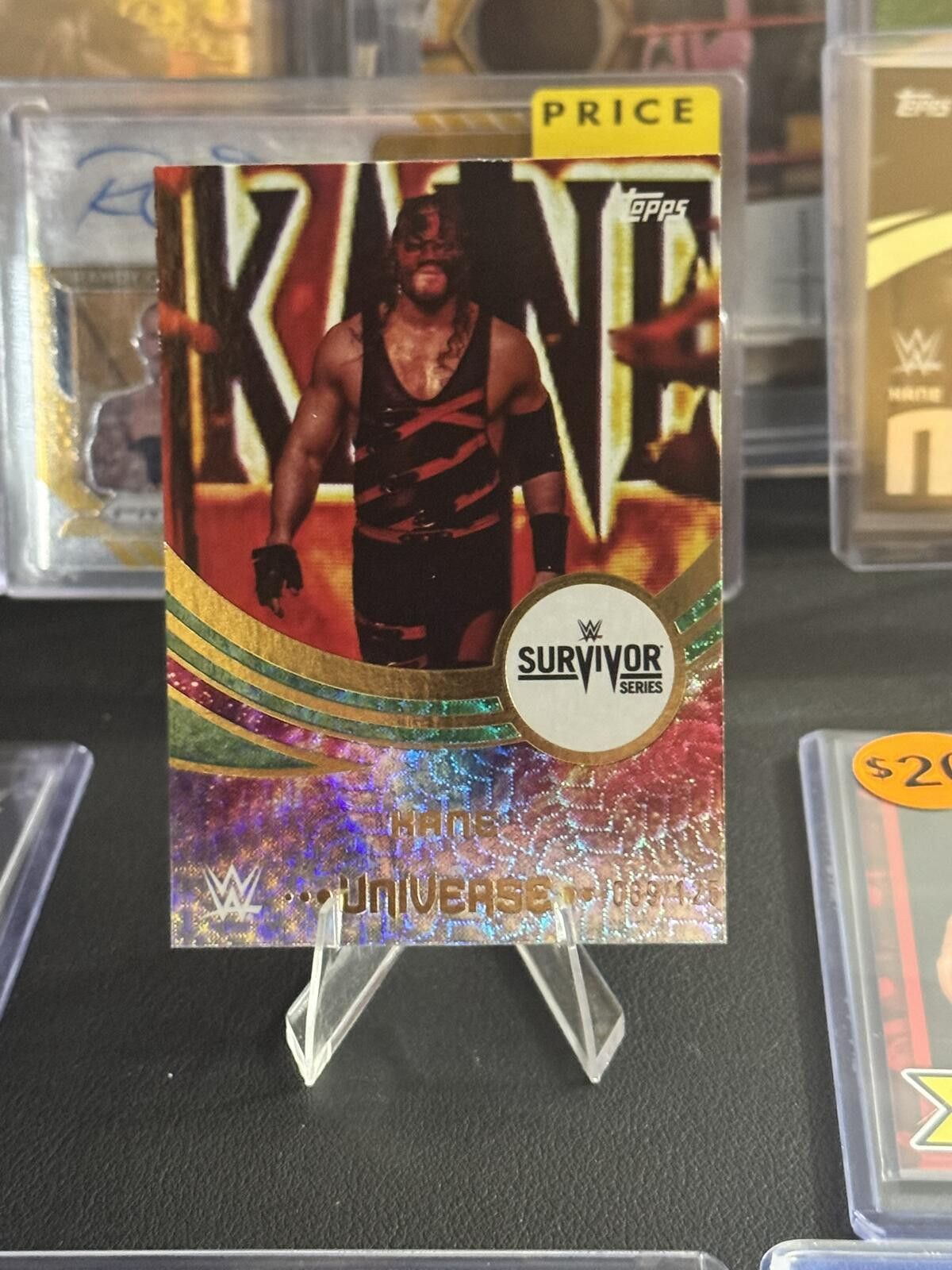 Topshop 2025 Topps WWE Universe Kane Green Electric Parallel /125 Size ONE SIZE - 1 Thumbnail