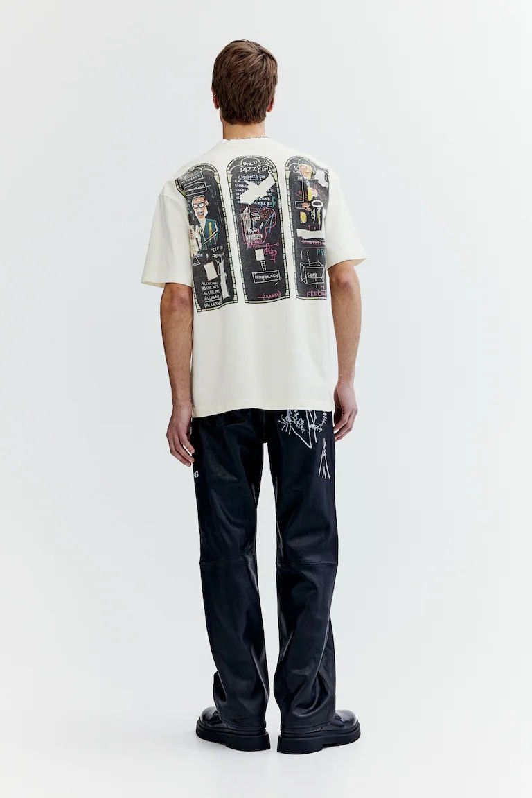 H&M × Jean-Michel Basquiat × Who Decides War WHO DECIDES WAR x BASQUIAT x H&M RELAXED FIT COTTON T-SHIRT Size US S / EU 44-46 / 1 - 6 Thumbnail