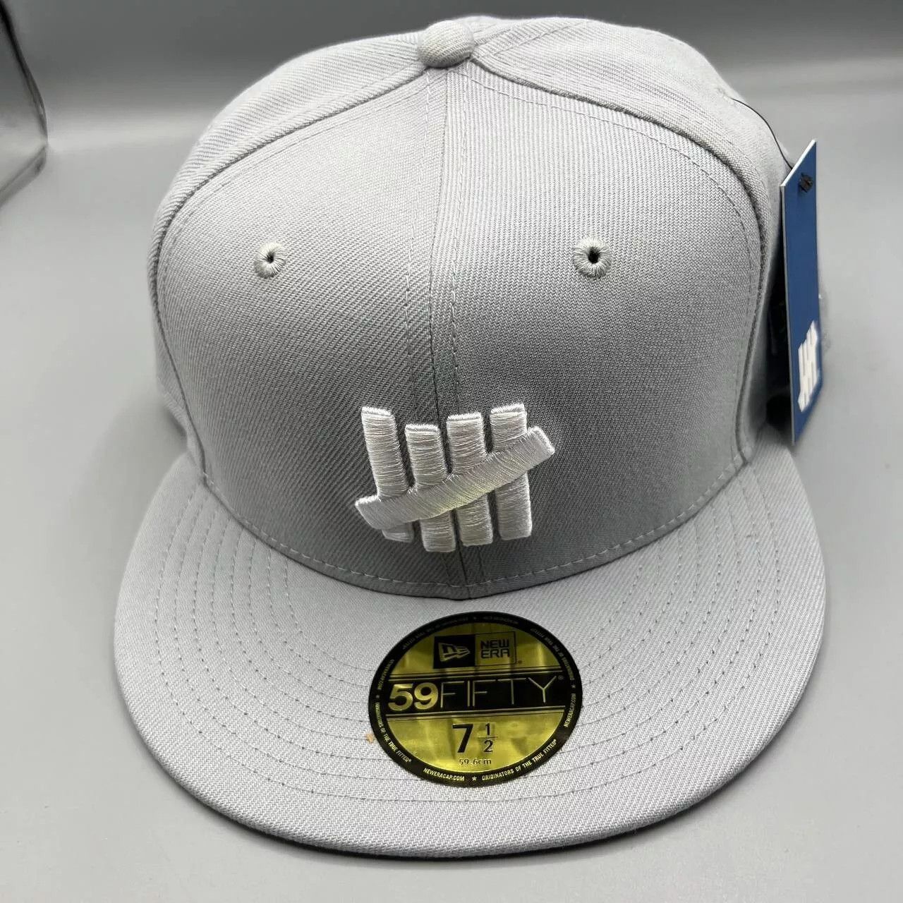 New Era Undefeated Hat Men 7 1/2 Gray 59Fifty New Era Fitted Cap 