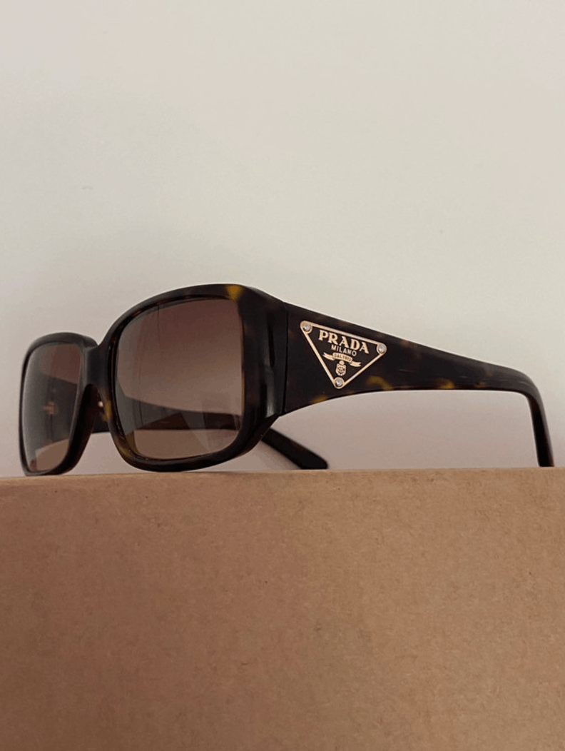 Prada Prada sunglasses vintage star logo wraparound archive y2k