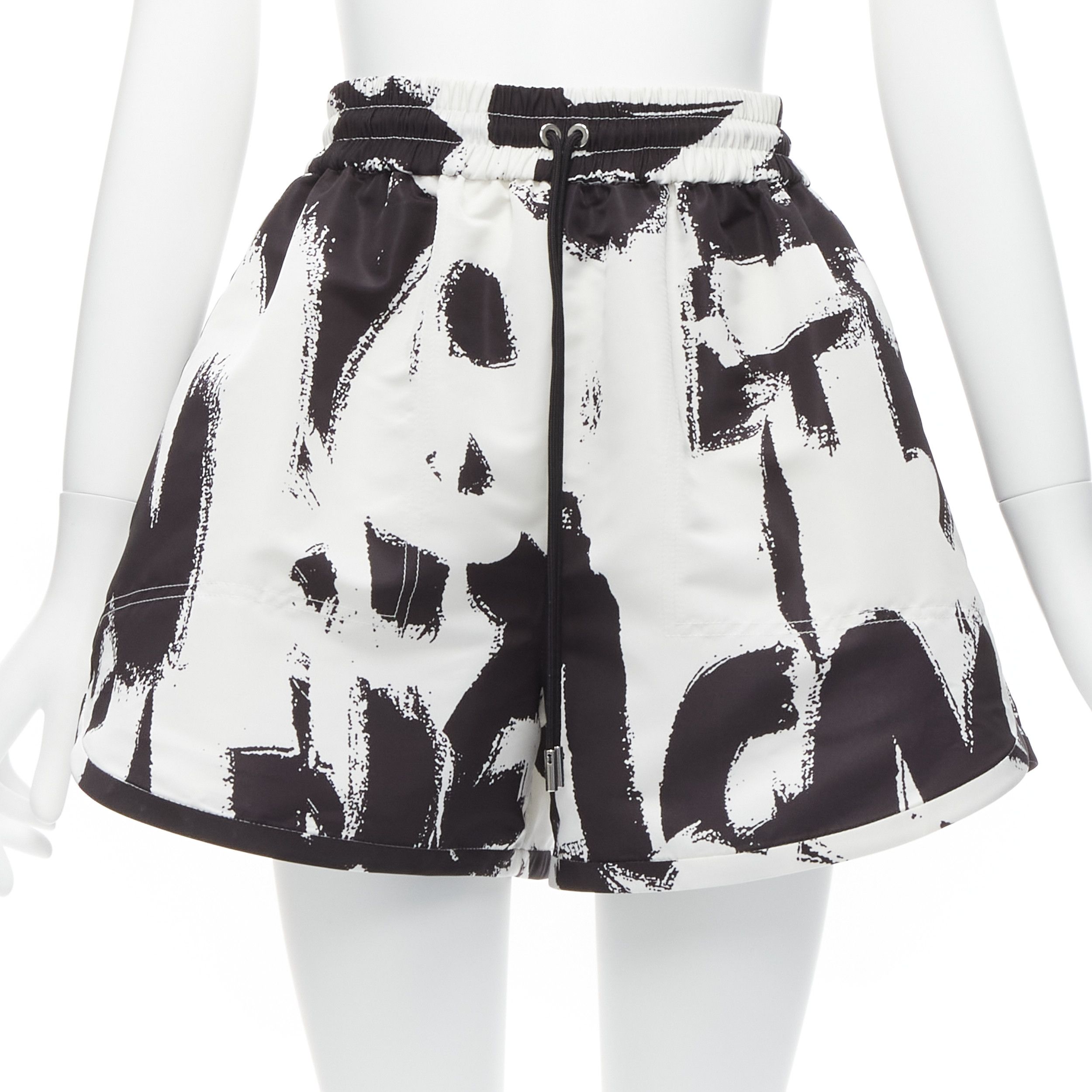 Alexander McQueen ALEXANDER MCQUEEN 2022 white Brush Graffiti logo lettering flared high waisted shorts IT36 XXS Size 25" / US 0 / IT 36 - 1 Thumbnail