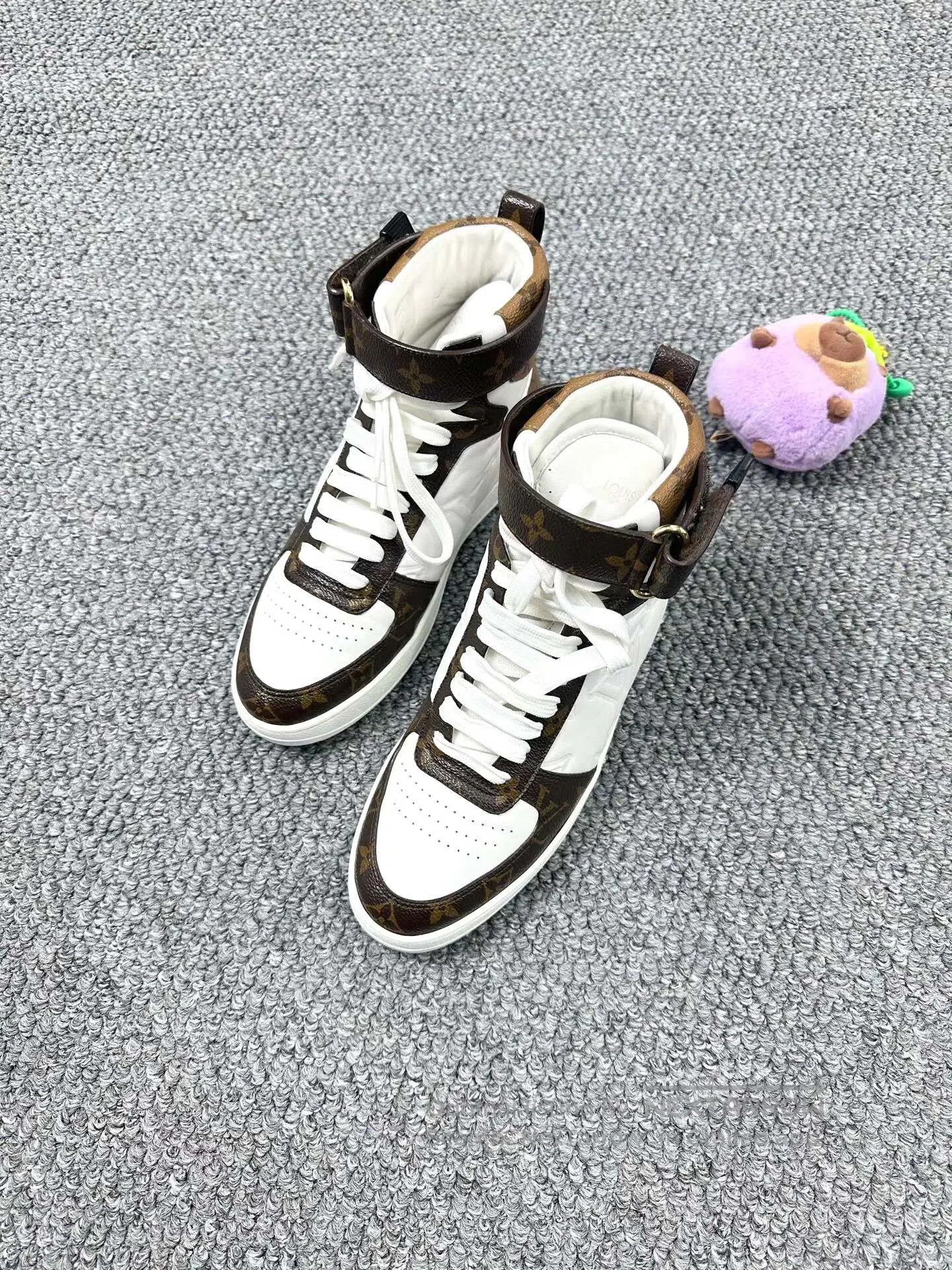 Louis Vuitton Louis Vuitton White and brown embossed logo high-top sneak Size US 7.5 / IT 37.5 - 1 Thumbnail
