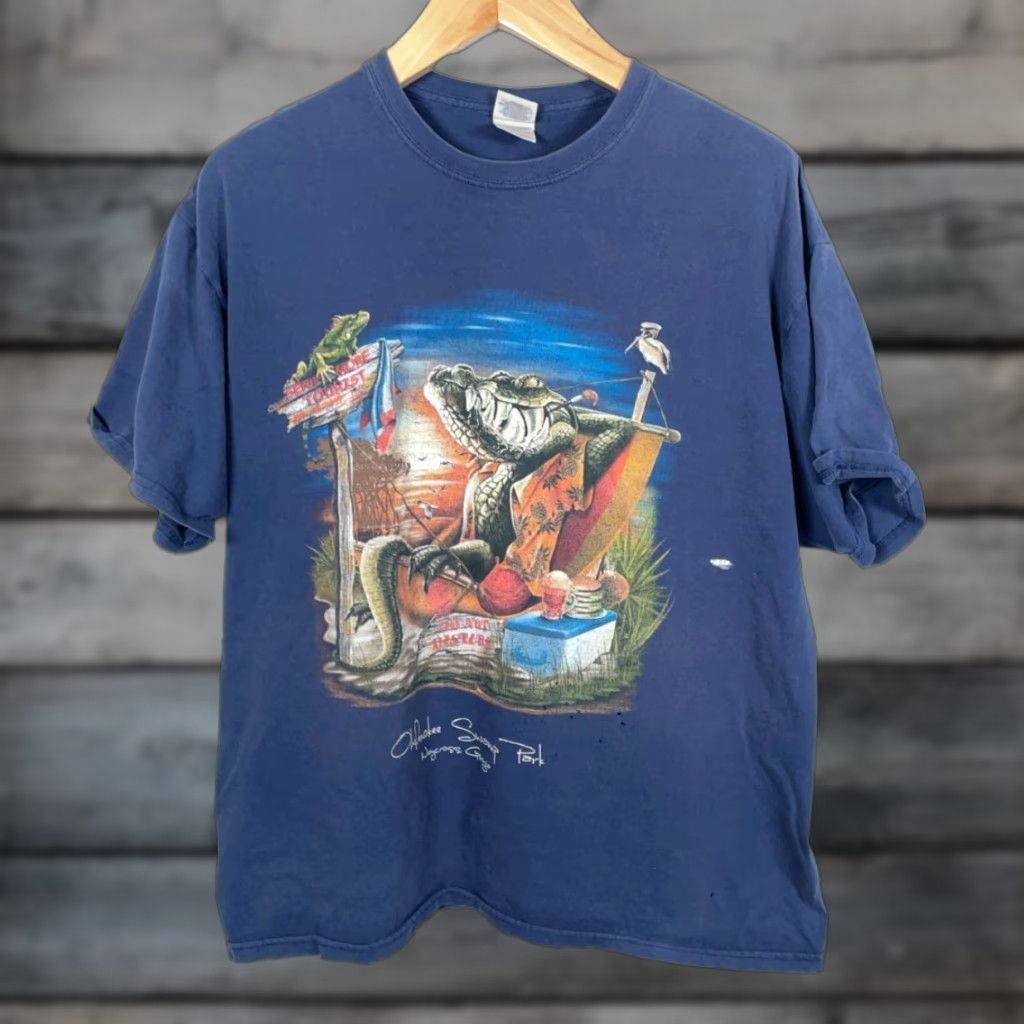 Gildan VINTAGE Distressed Okefenokee Swamp T-Shirt Adult XL Dark Blue Gildan Logo Short Sleeve Crew Neck 100% Cotton Men’s Retro 2000s Size US XL / EU 56 / 4 - 1 Thumbnail