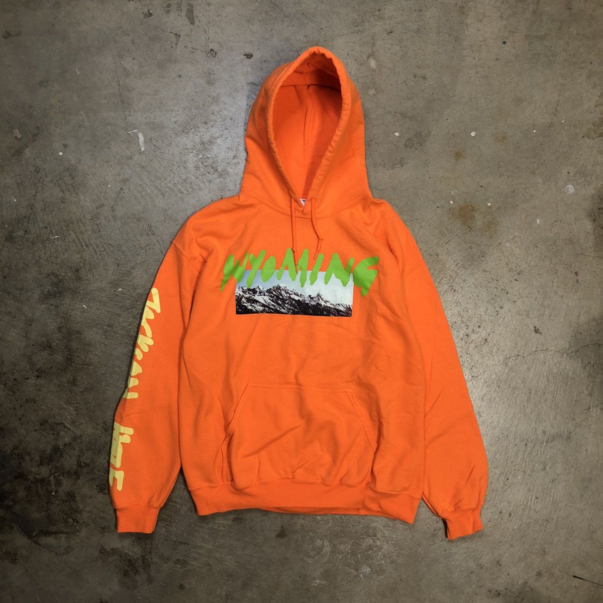 image of Kanye West Wyoming Album Listening Jackson Hole in Orange, Men's (Size Large)