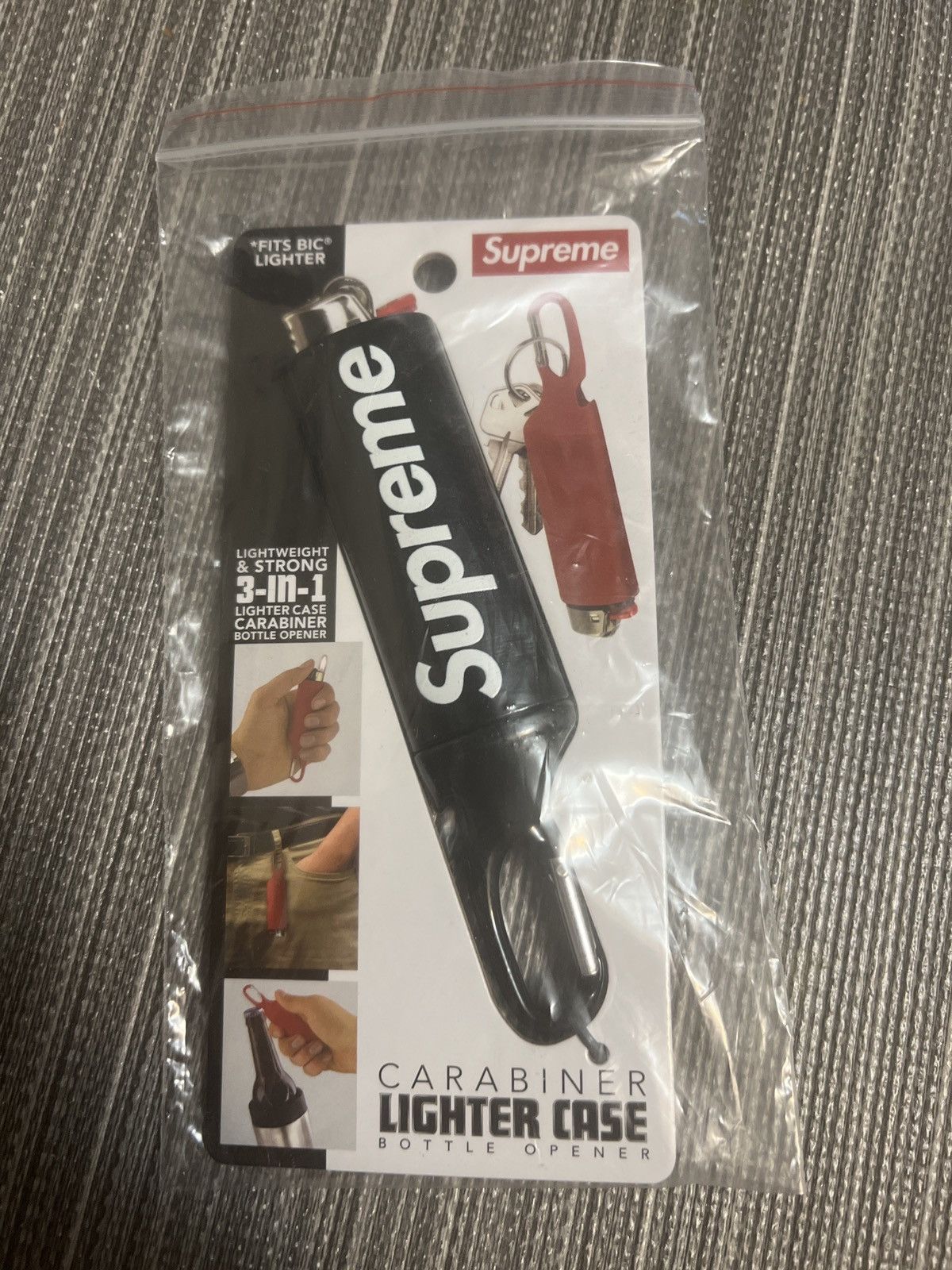 Supreme Supreme, carabiner, lighter case, bottle opener Grailed
