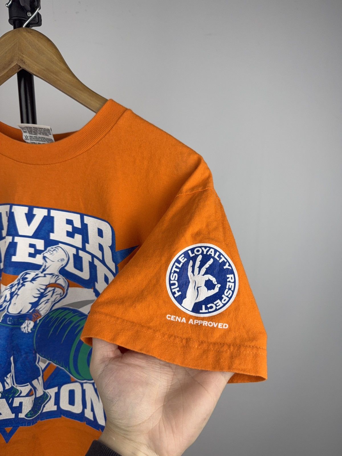 WWE WWE 2008 John Cena Never Give Up Tee Orange Youth L / S Size US S / EU 44-46 / 1 - 12 Thumbnail
