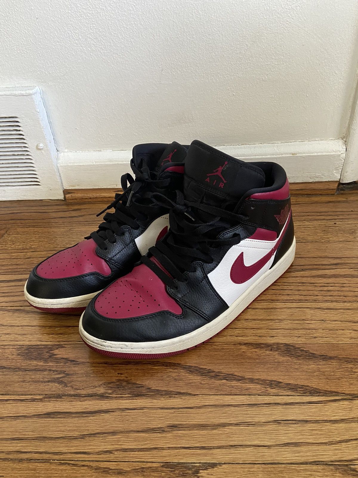 image of Air Jordan 1 Mid Shoes in Black, Men's (Size 10)