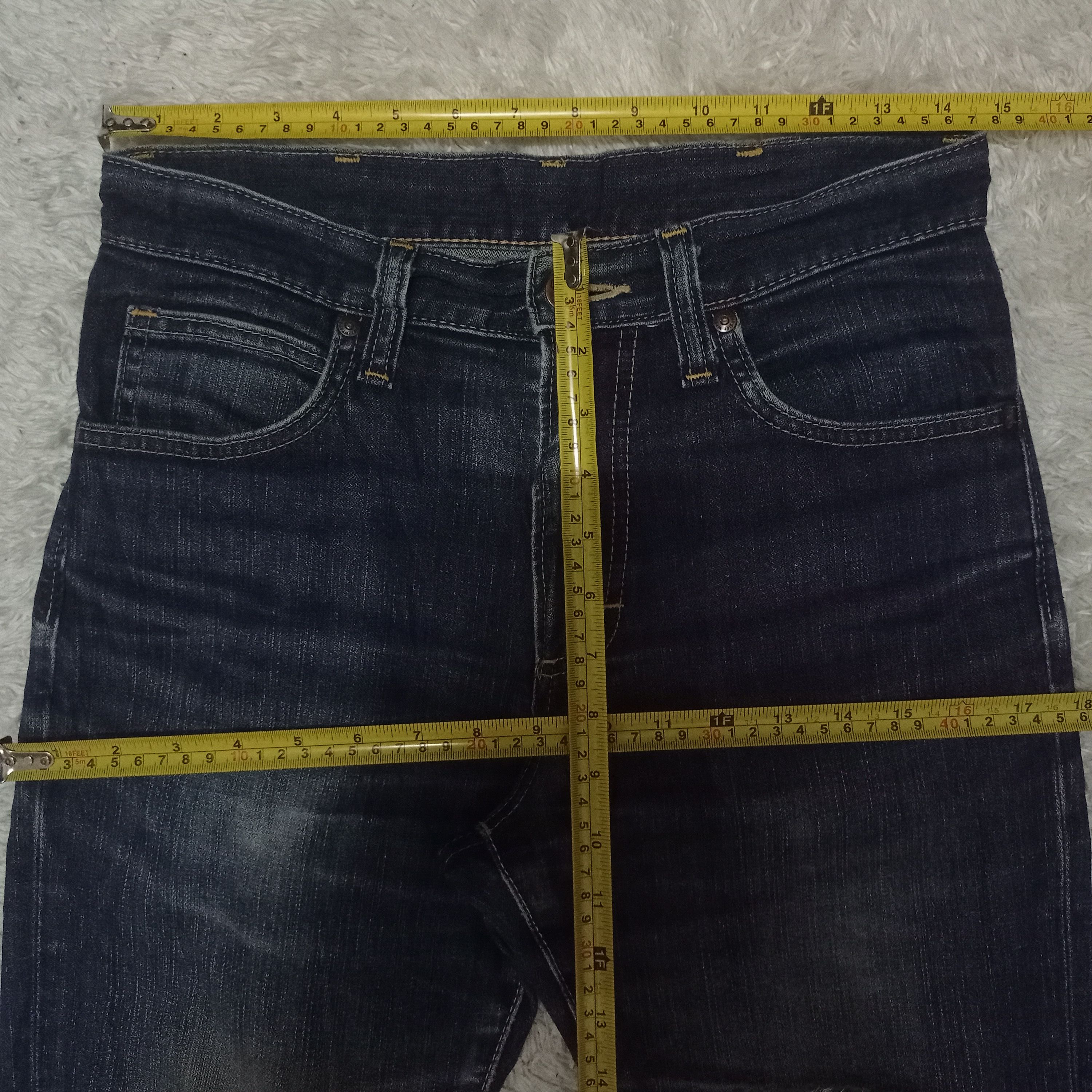 Vintage Wrangler Indigo Mud Wash Distressed Jeans 29x29