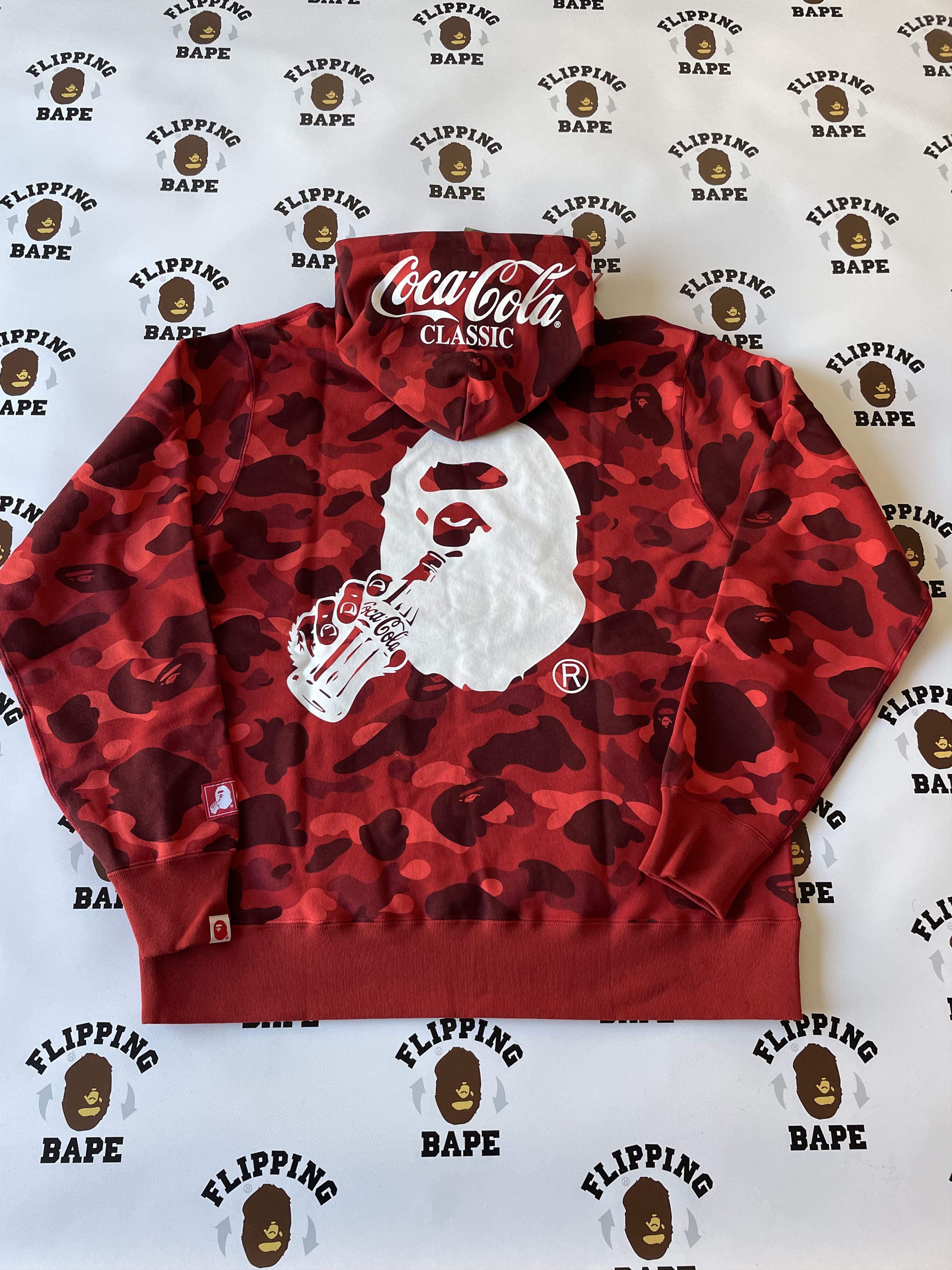 Image of Bape X Coca-Cola Color Camo Ape Head Pullover Hoodie in Red, Men's (Size XL)