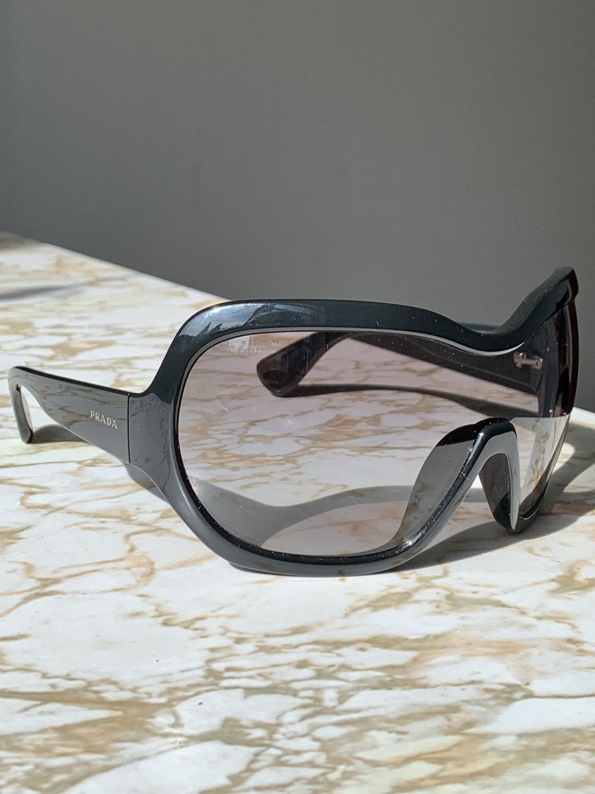 Take A Look About Prada Illusion Sunglasses