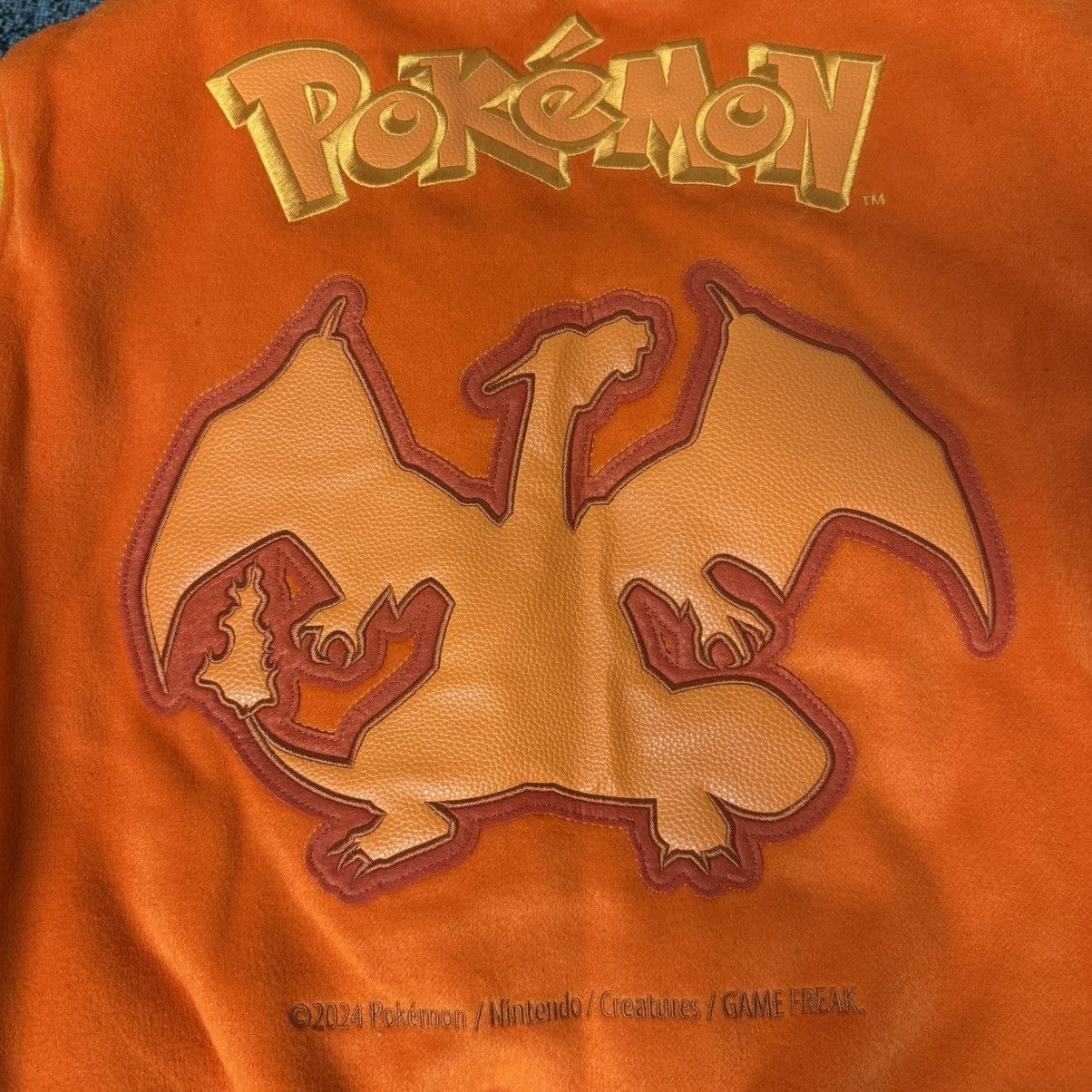 Pokemon × Vandy The Pink VANDY THE PINK X POKÉMON CHARIZARD VARSITY JACKET ORANGE Size US L / EU 52-54 / 3 - 7 Thumbnail