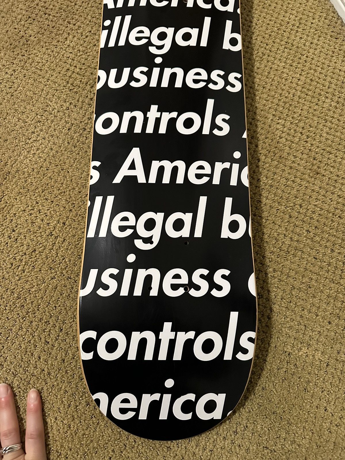 image of Supreme Illegal Business Skate Deck in Black, Men's