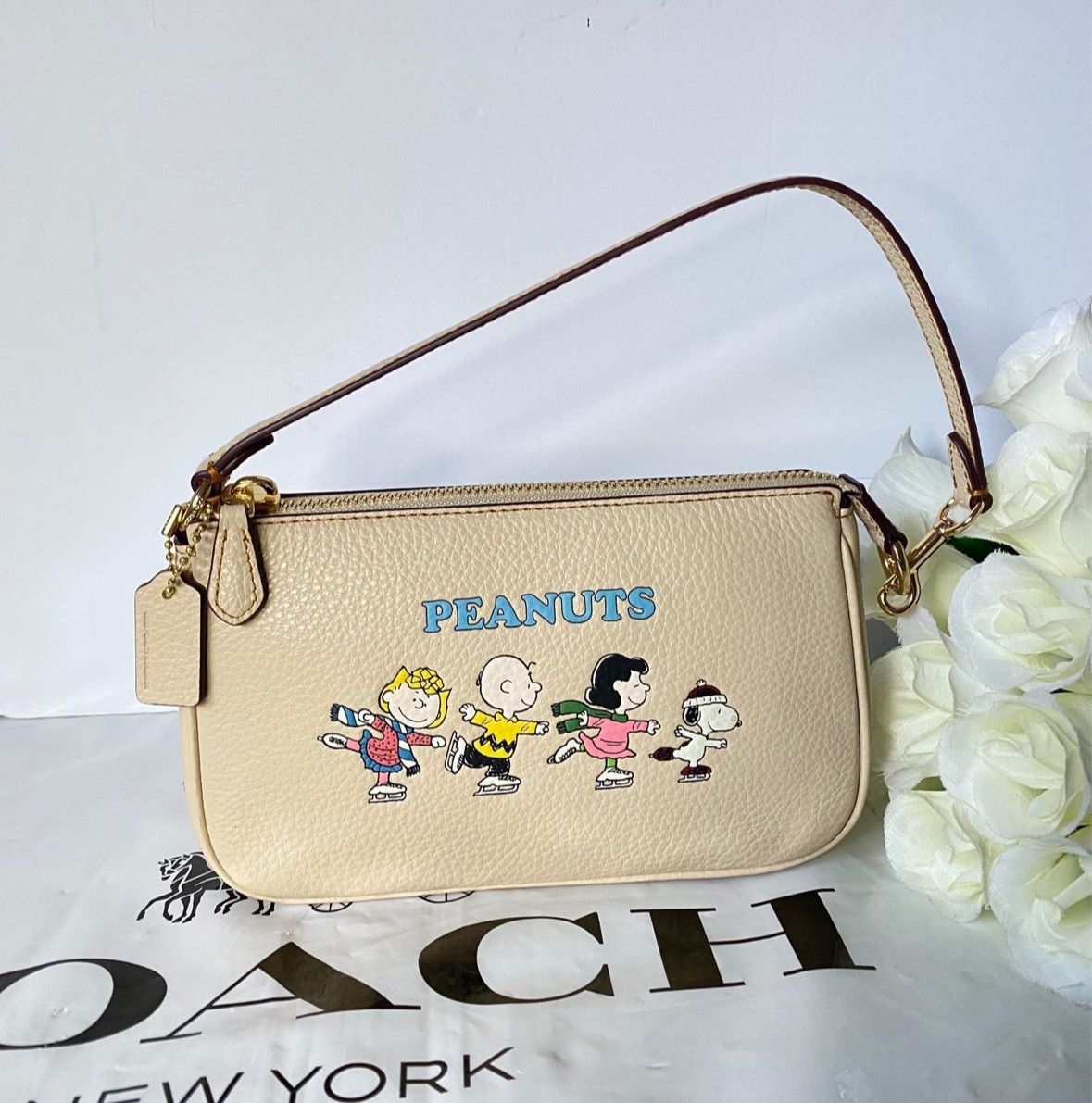 国内即送COACH X PEANUTS スヌーピー ノリータ 19 ポーチ CE858 国内即送COACH X PEANUTS スヌーピー ノリータ 19 ポーチ CE858