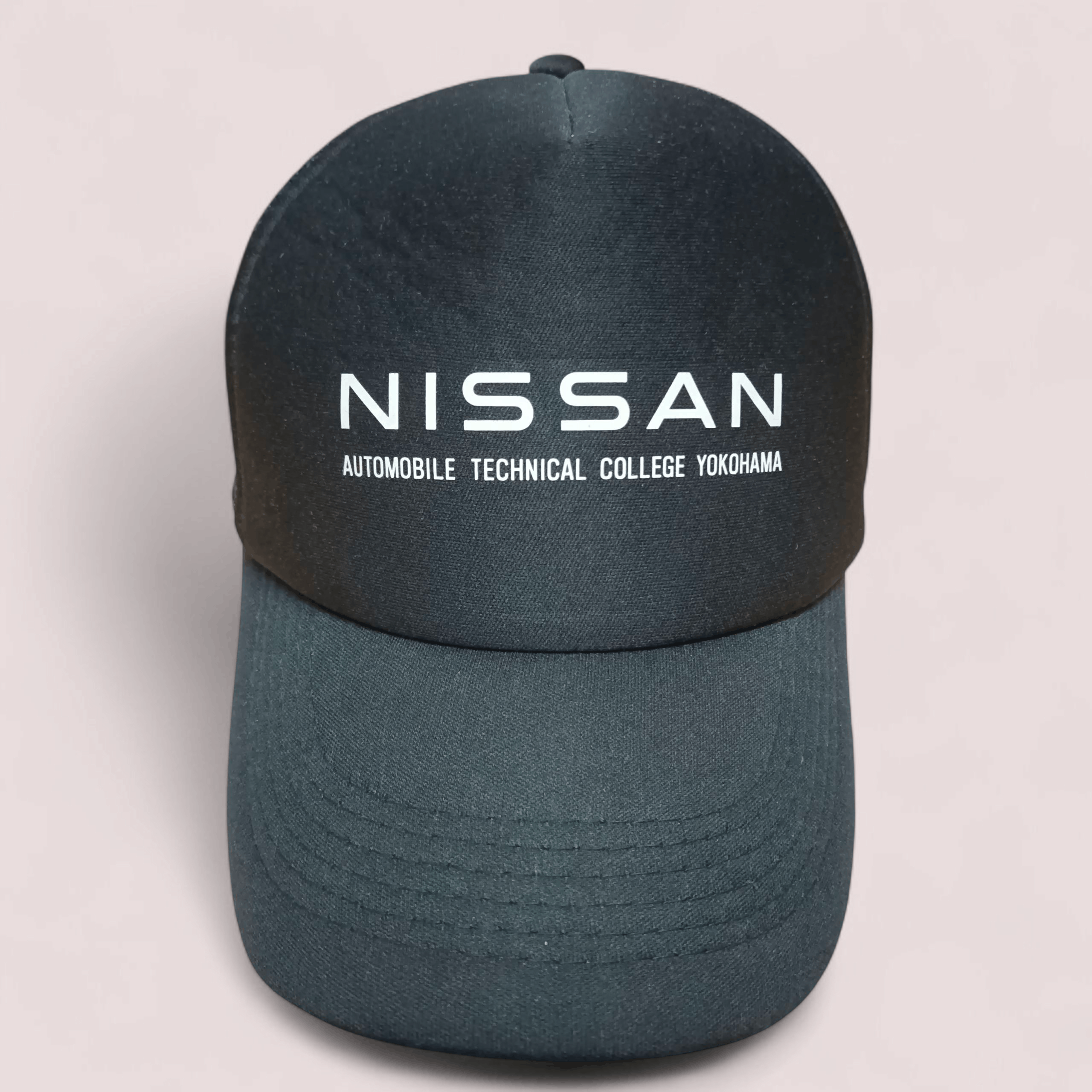Vintage Nissan Automobile Technical College Trucker Hat