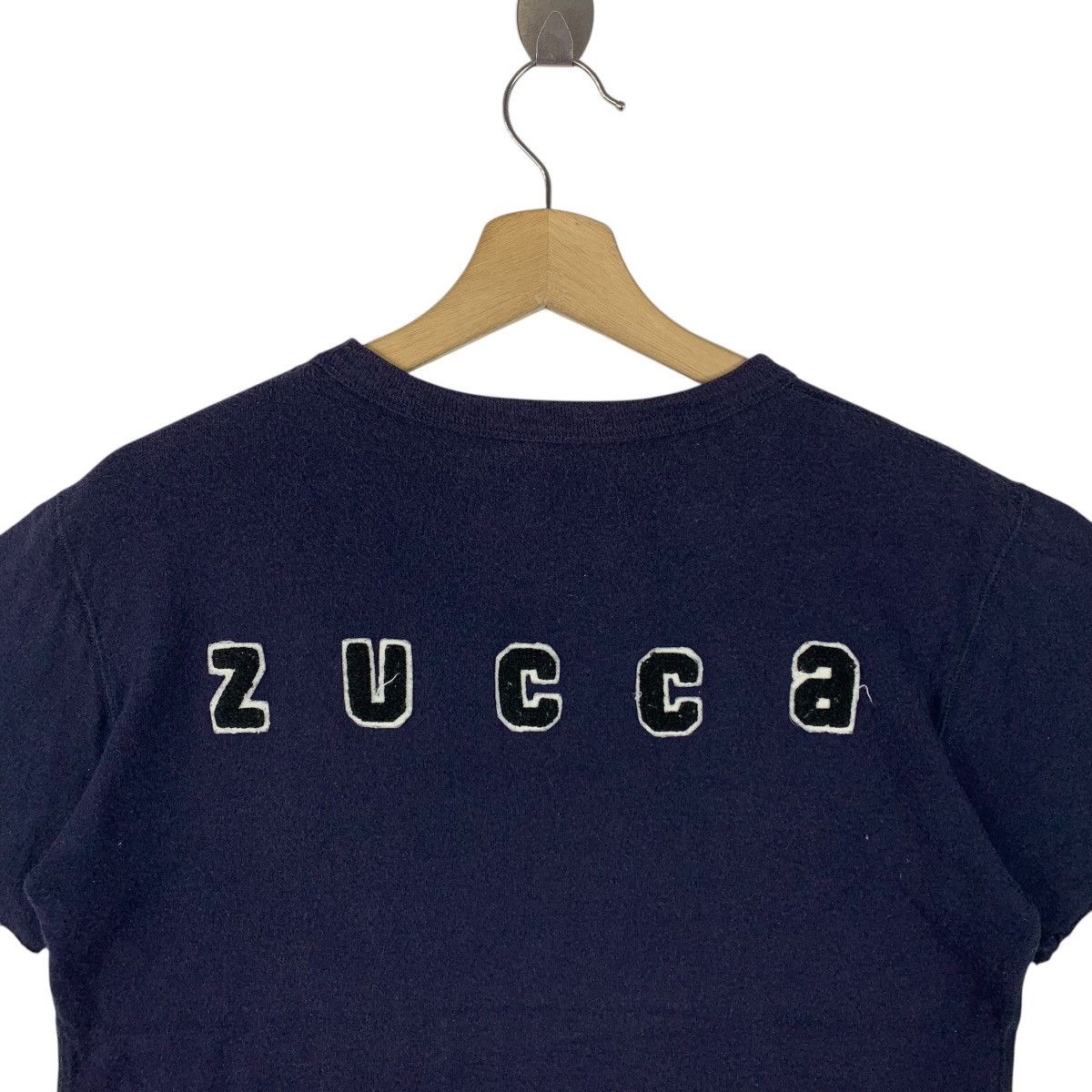 CABANE de ZUCCa × Zucca ZUCCA do not step on the wing tag Zucca back spellout tee Size US S / EU 44-46 / 1 - 10 Thumbnail