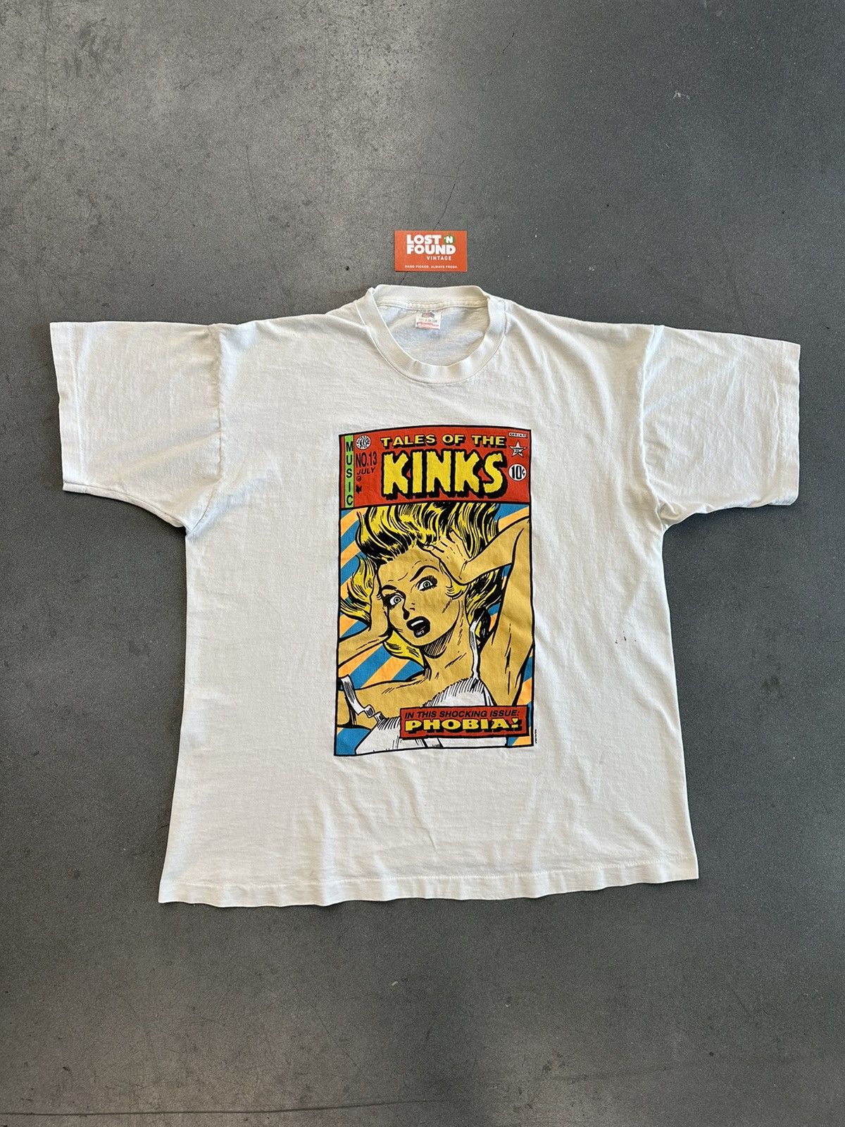 image of Band Tees x Made In USA 1993 Vintage Tale Of The Kinks Frank Kozik Phobia Tour Tee in White (Size X