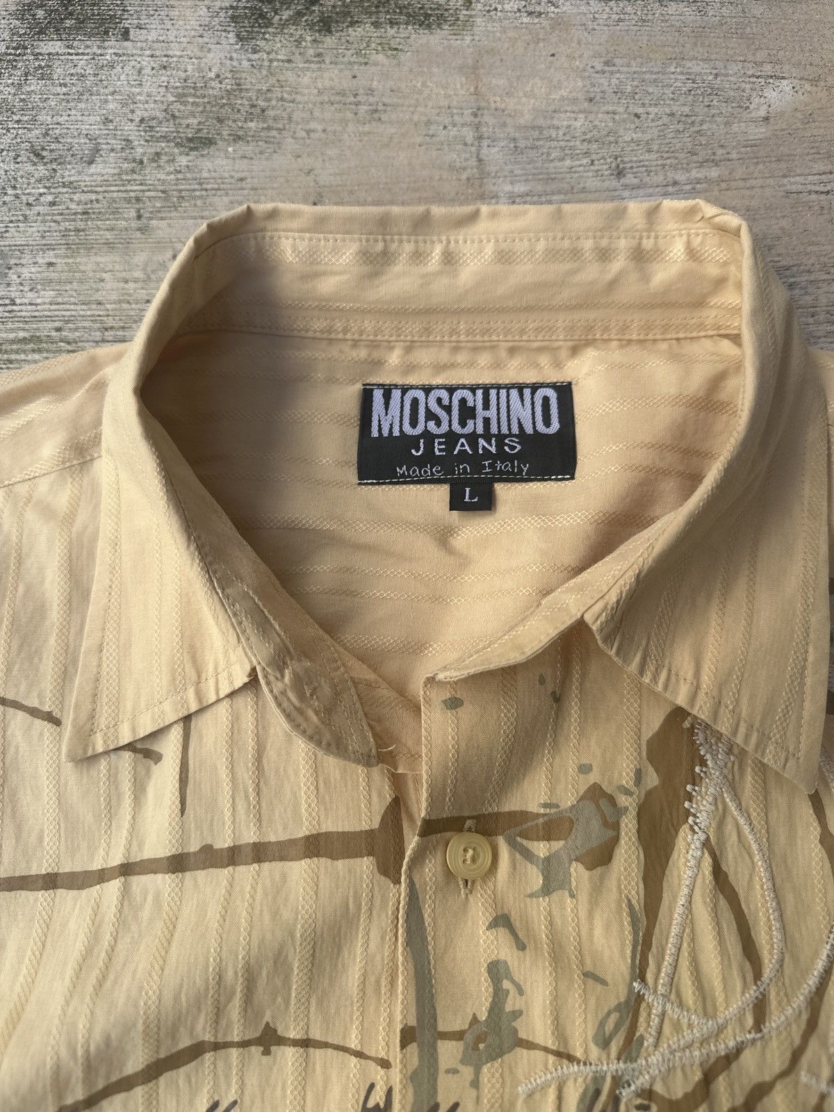 Affliction × Moschino × Tapout Y2k 2000s grunge tribal aop affliction tapout moschino tee Size US L / EU 52-54 / 3 - 4 Thumbnail