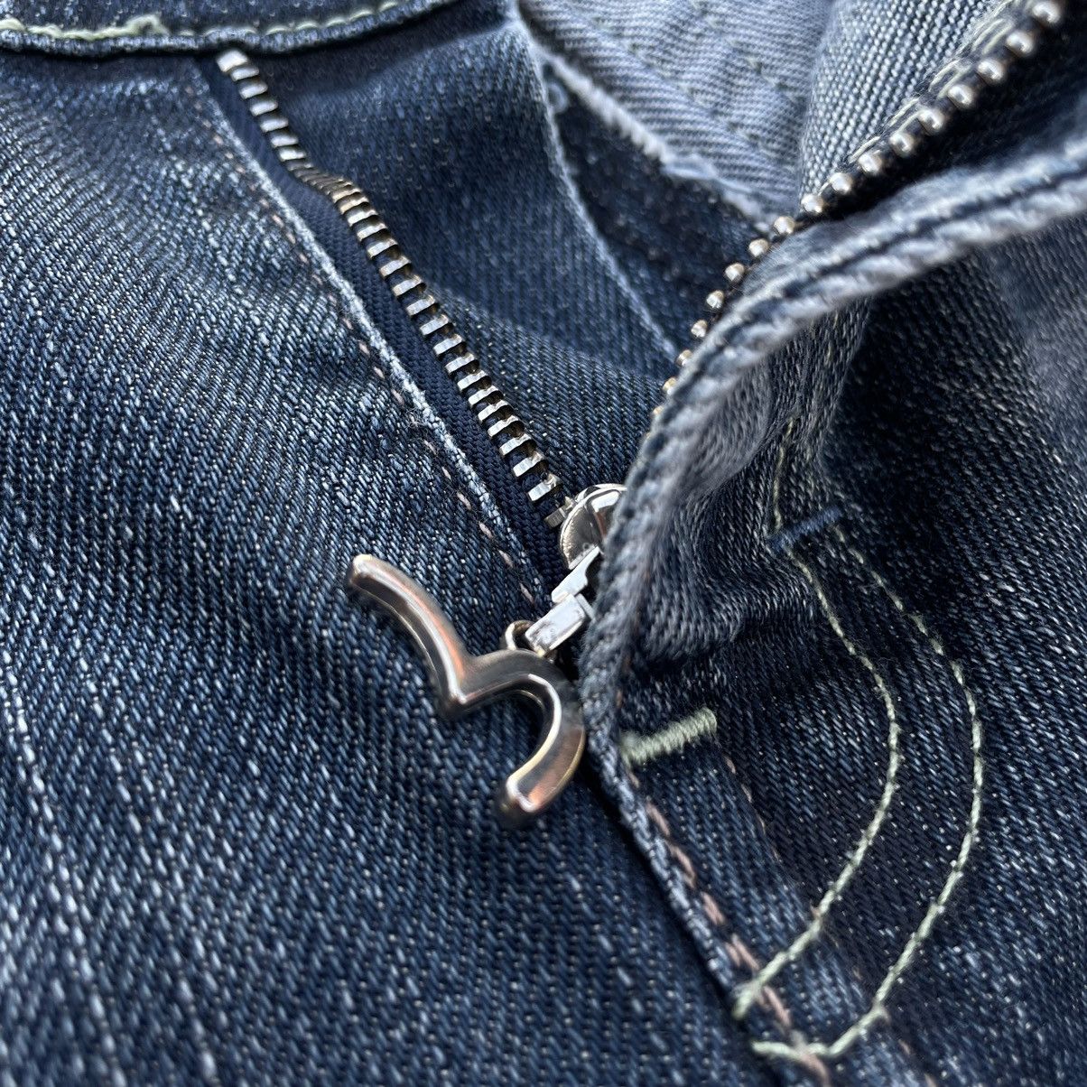 VINTAGE Y2K EVISU X PUMA DISTRESSED WASHED DENIM PANTS