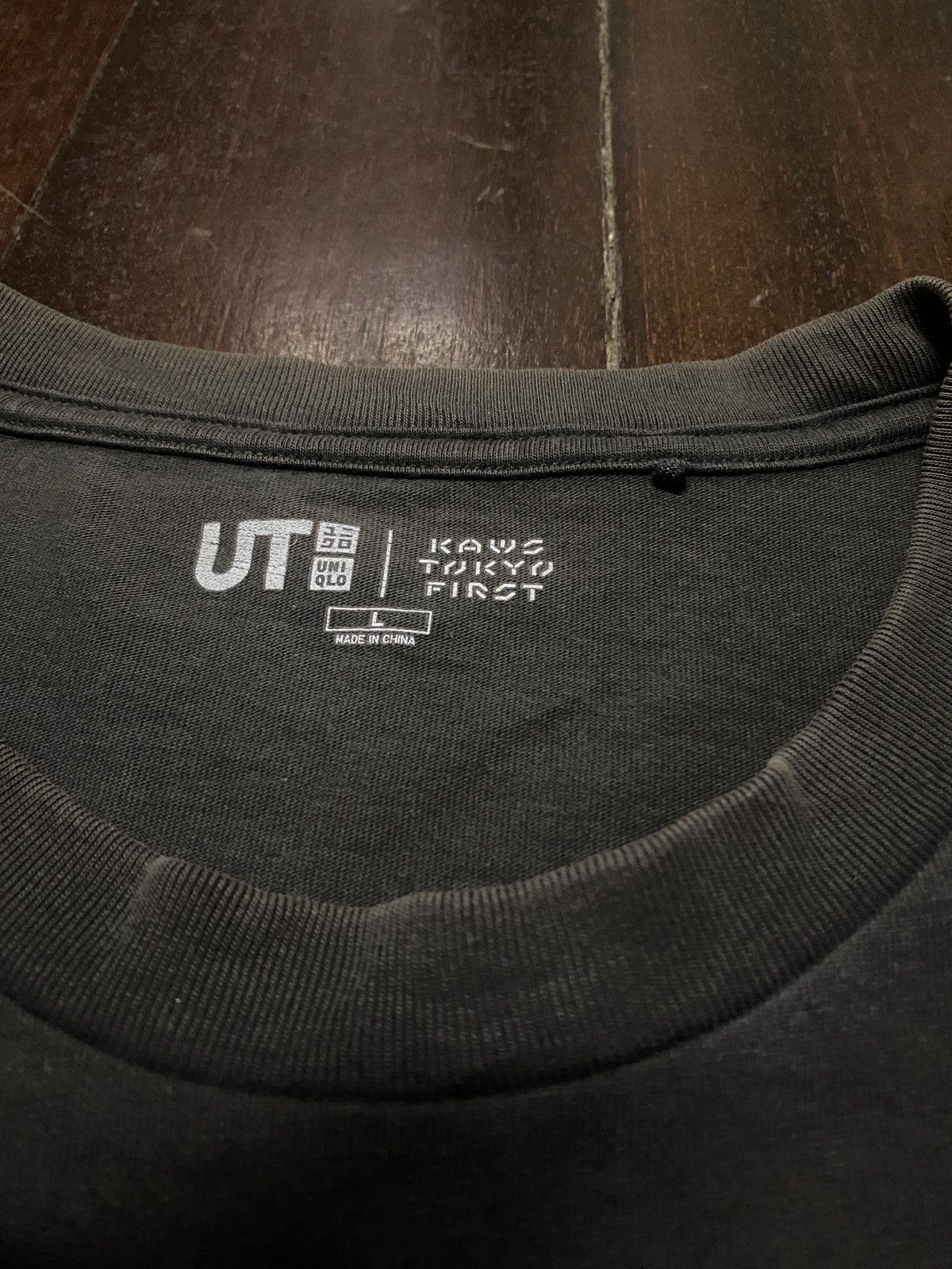 Hypebeast × Kaws FIRE 🔥🔥 UNIQLO X KAWS TOKYO FIRST SAD DESIGN Size US L / EU 52-54 / 3 - 13 Thumbnail