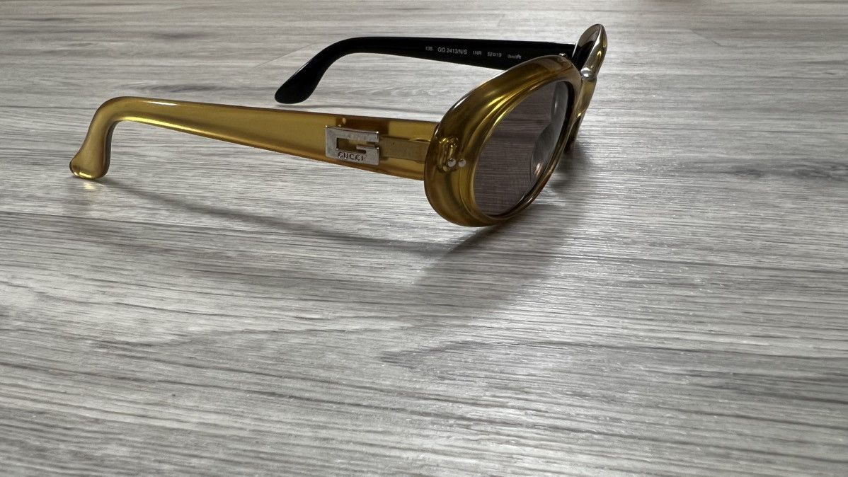 Vintage Gucci Vintage gold sunglasses with black inner temples Size ONE SIZE - 4 Thumbnail