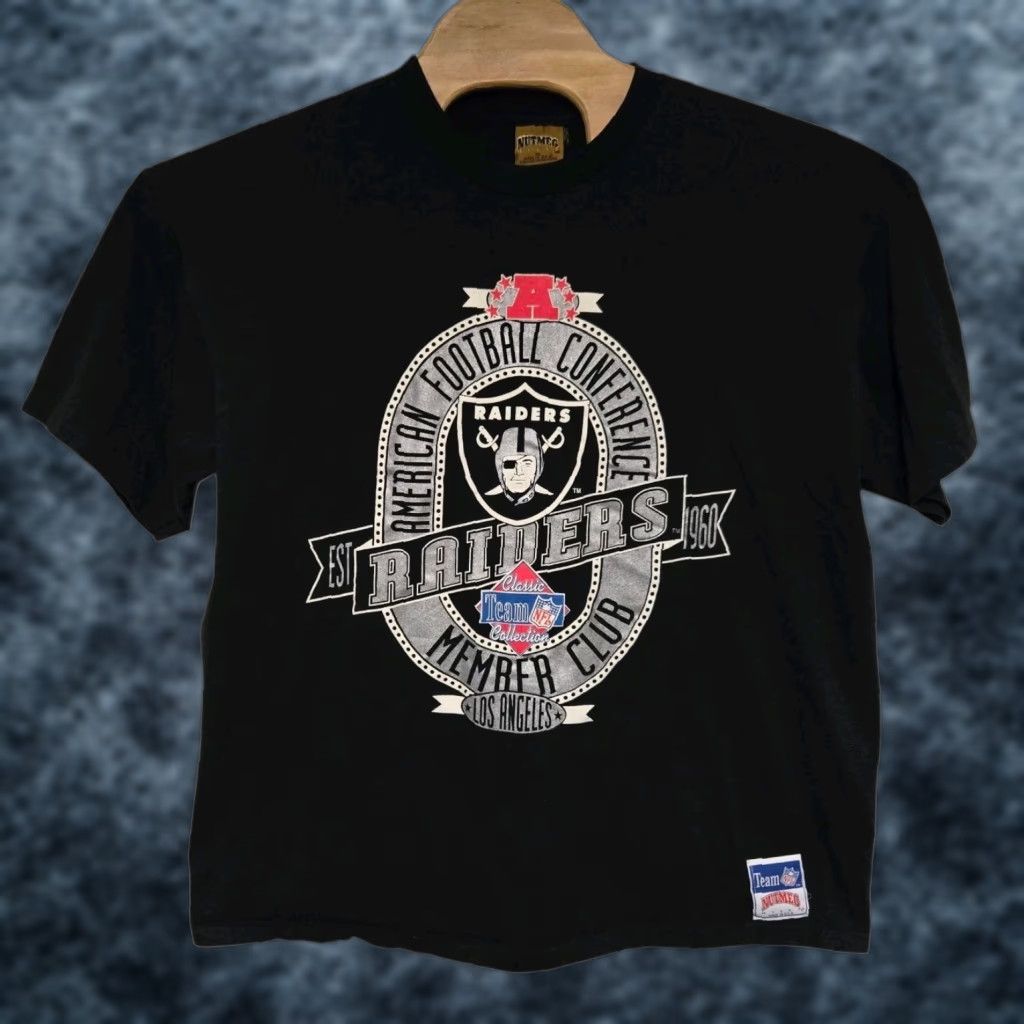 Nutmeg VINTAGE Nutmeg Raiders T-Shirt Men XL Black 90s USA NFL Warrior Angel Graphic Print Crew Neck Short Sleeve Size US XL / EU 56 / 4 - 1 Thumbnail