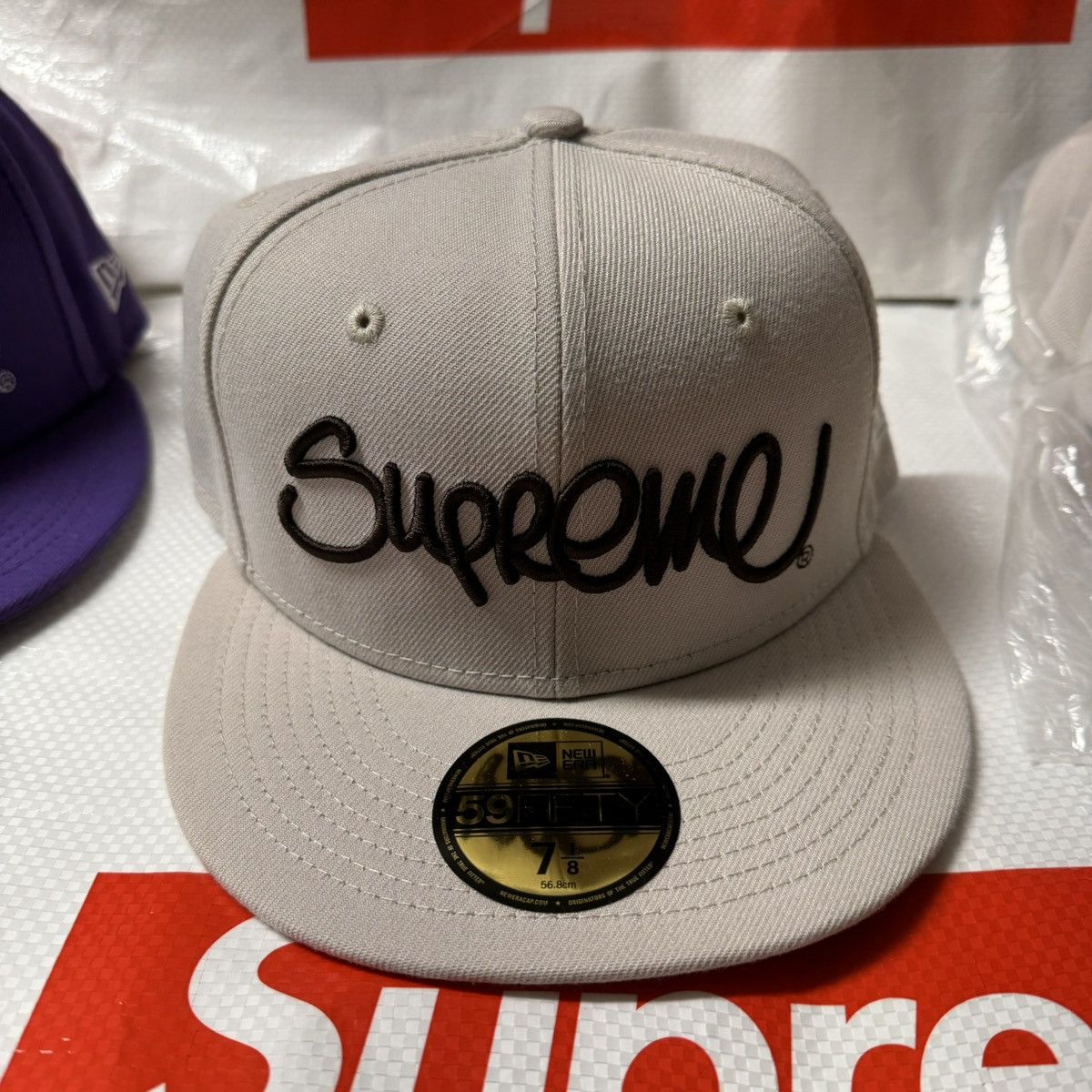 Supreme Supreme hand style new era stone color 7 1/8 | Grailed