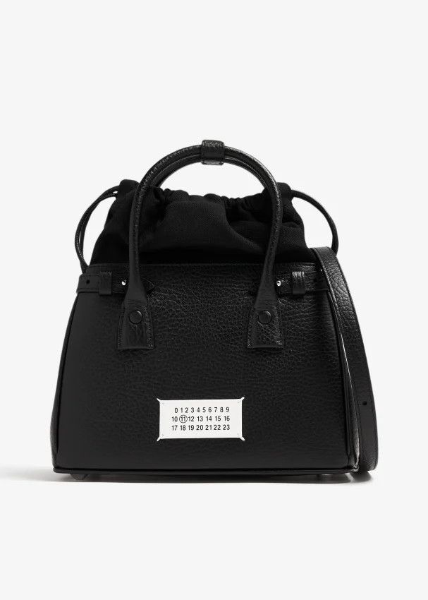 Maison Margiela oc11z0325 Size: OS / Mini Drawstring Bag in Black Size ONE SIZE - 1 Thumbnail
