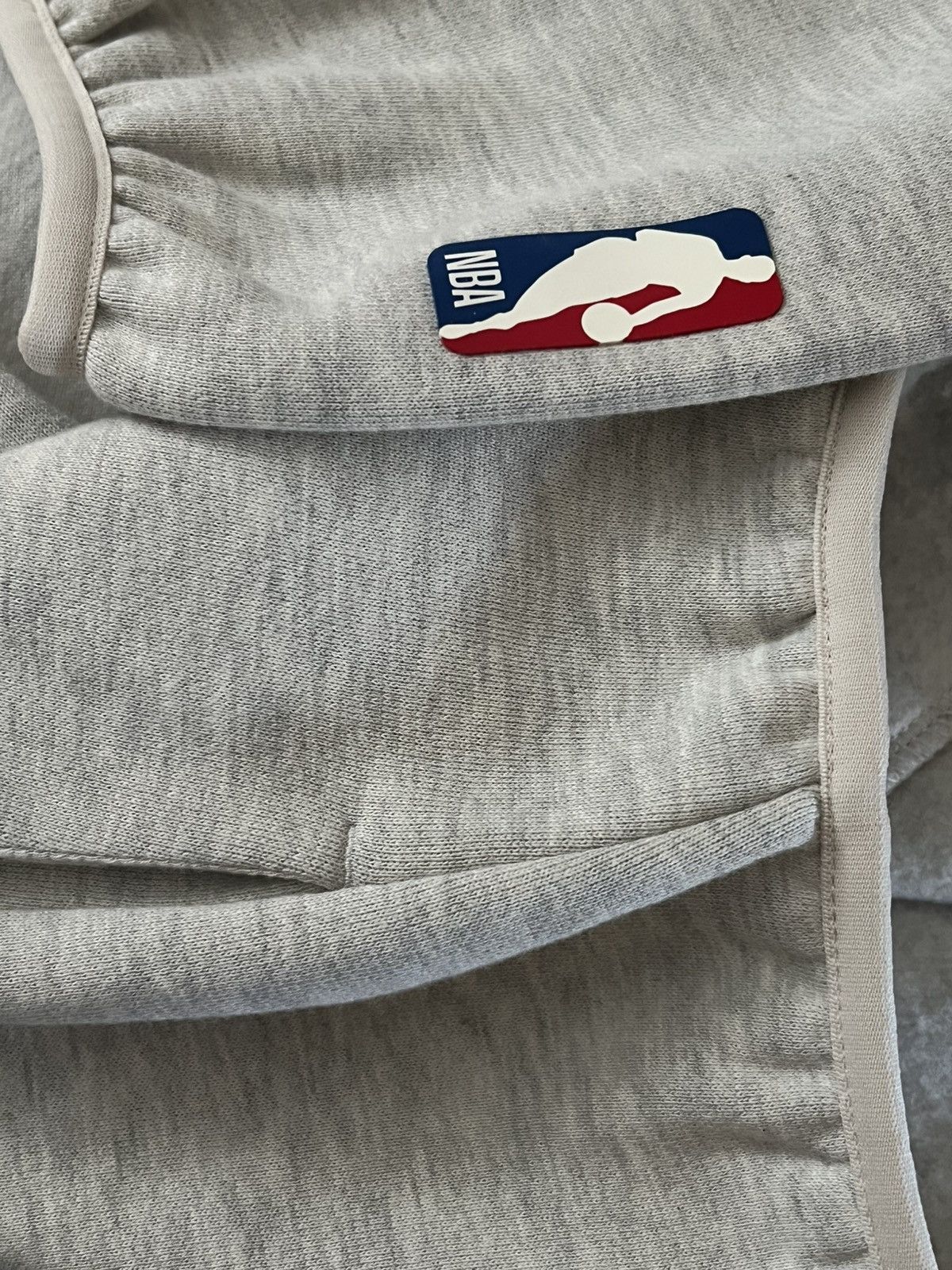 Essentials × NBA Fear of God Essentials NBA Hoodie Hawks light heather Size US L / EU 52-54 / 3 - 7 Thumbnail