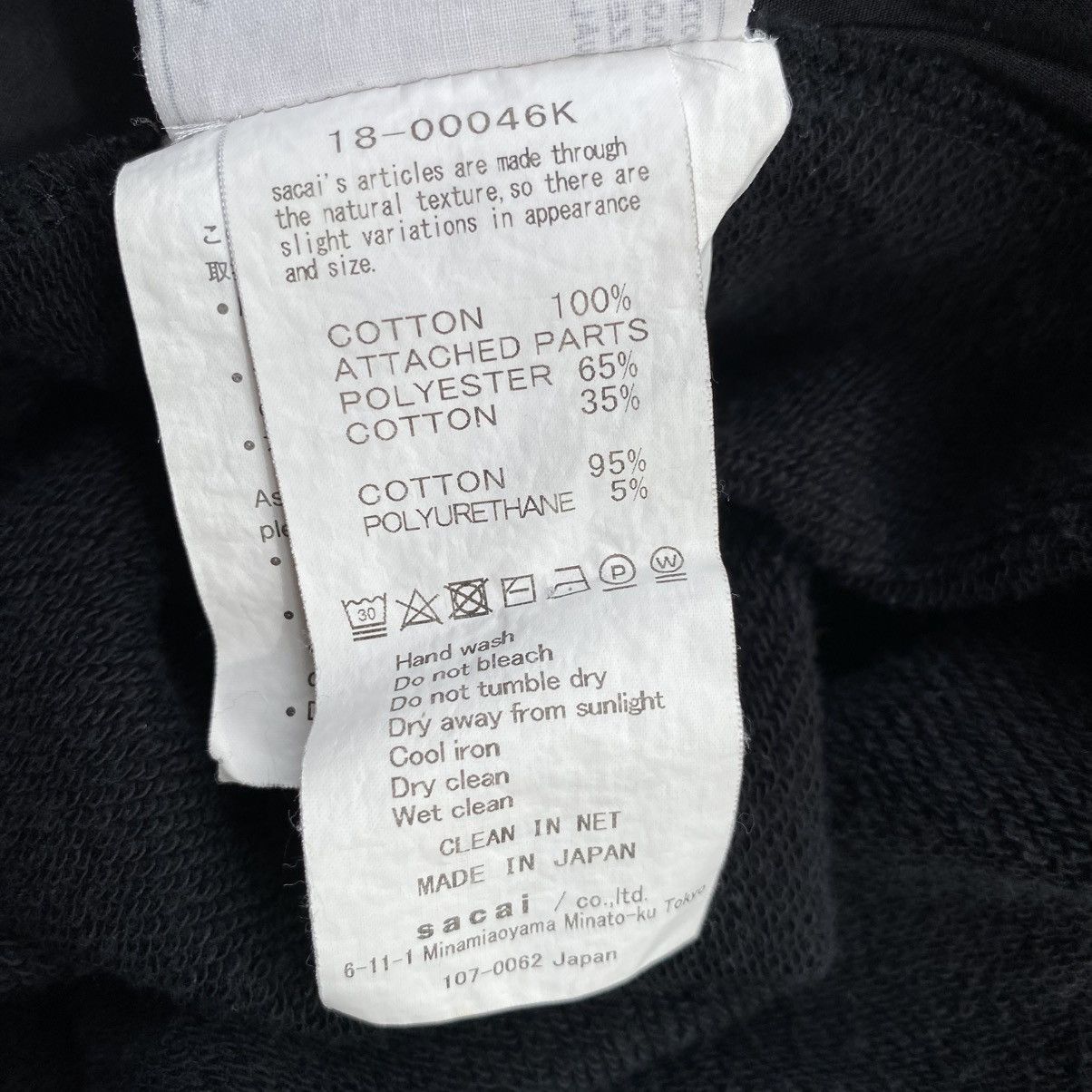 Sacai X Nike Black Short Sleeve Nike Top with Ruffle Trim