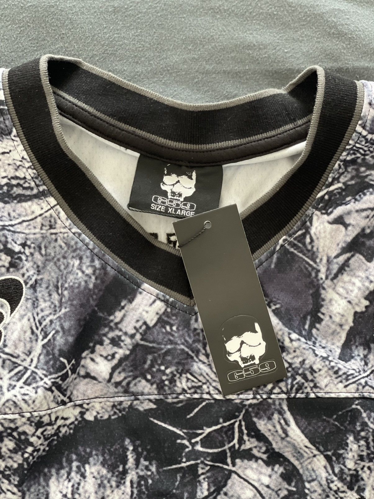 G59 Records G59 “5” FOOTBALL JERSEY (CAMO) Size US XL / EU 56 / 4 - 3 Thumbnail