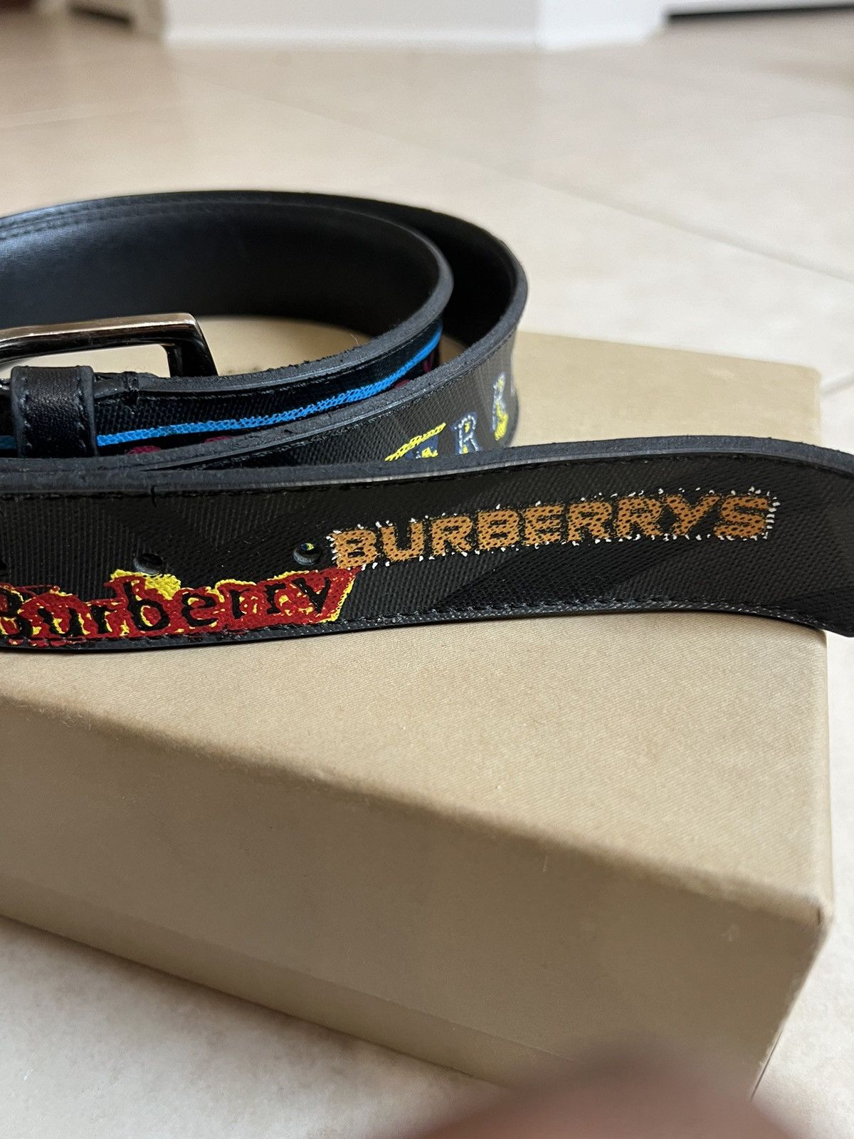 image of Burberry Graffiti Logo Print London Check Leather Belt in Black, Men's (Size 30)