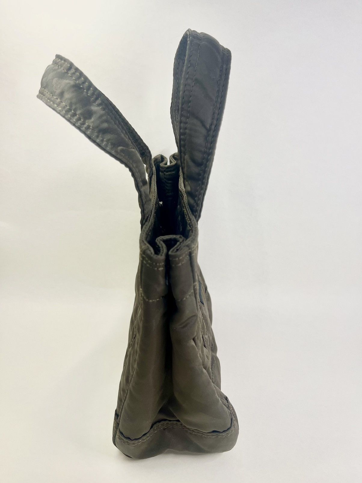 Original Fake KAWS x OriginaFake x Porter Yoshida mini tote | Grailed
