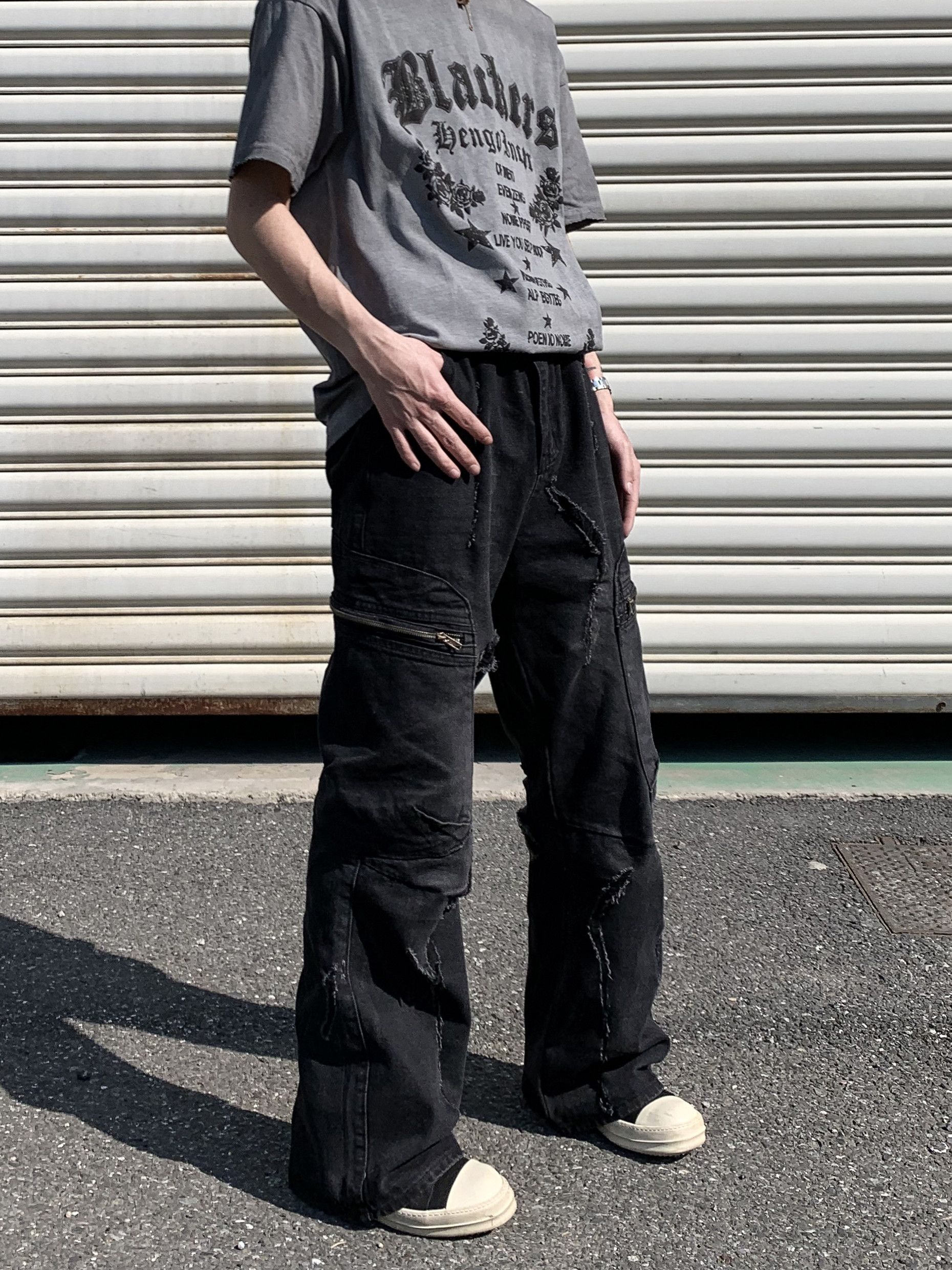 faded damaged ripped flared cargo pants