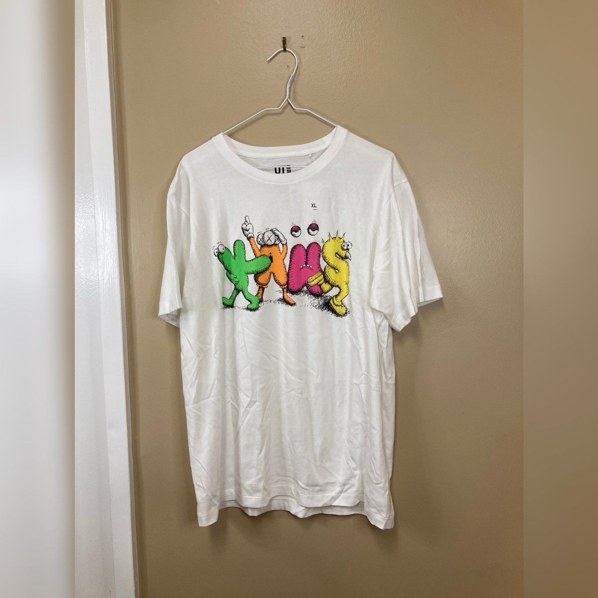 image of Kaws Uniqlo Logo T-Shirt White Japanese Sizing, Men's (Size XL)