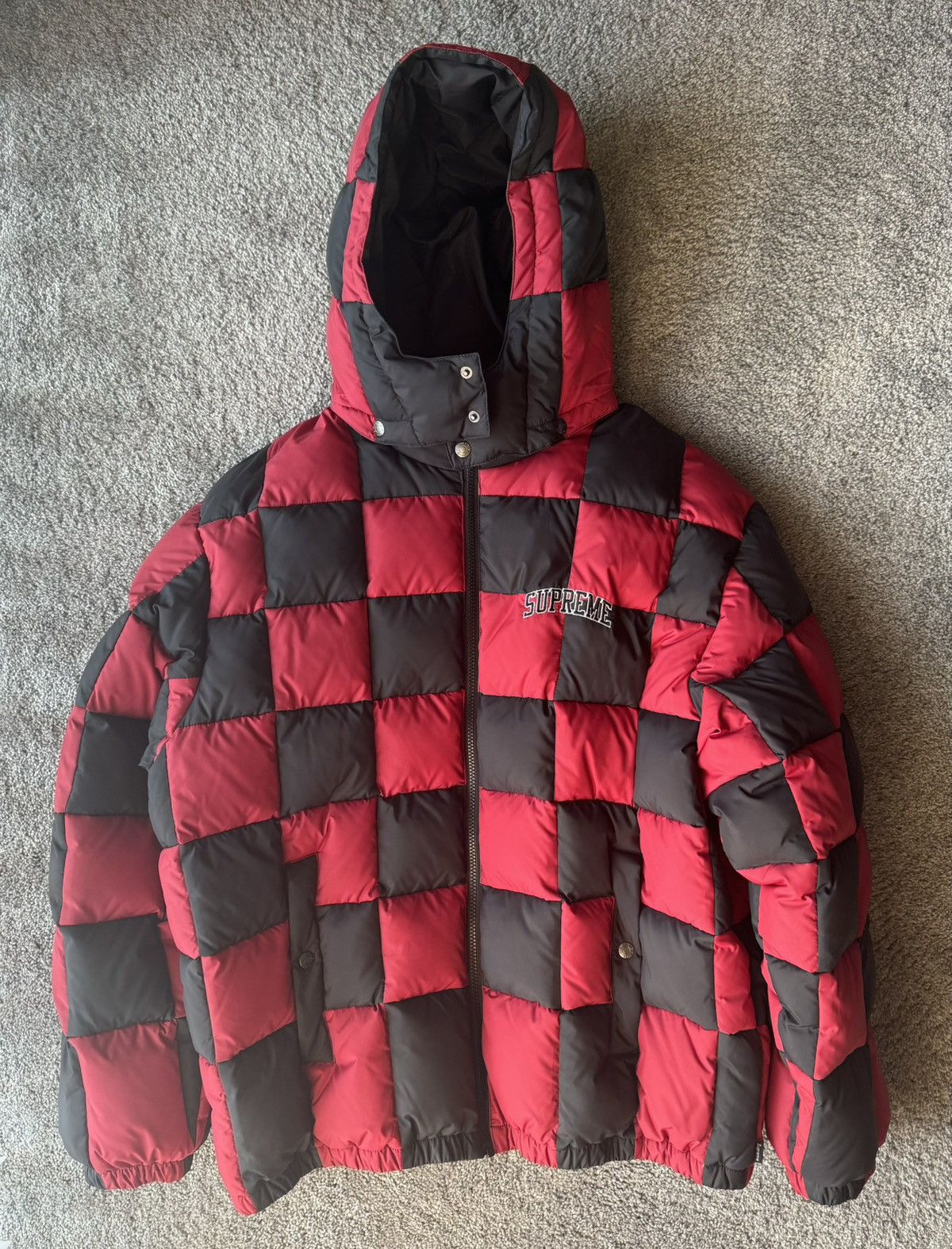 Supreme checkerboard puffy jacket deals