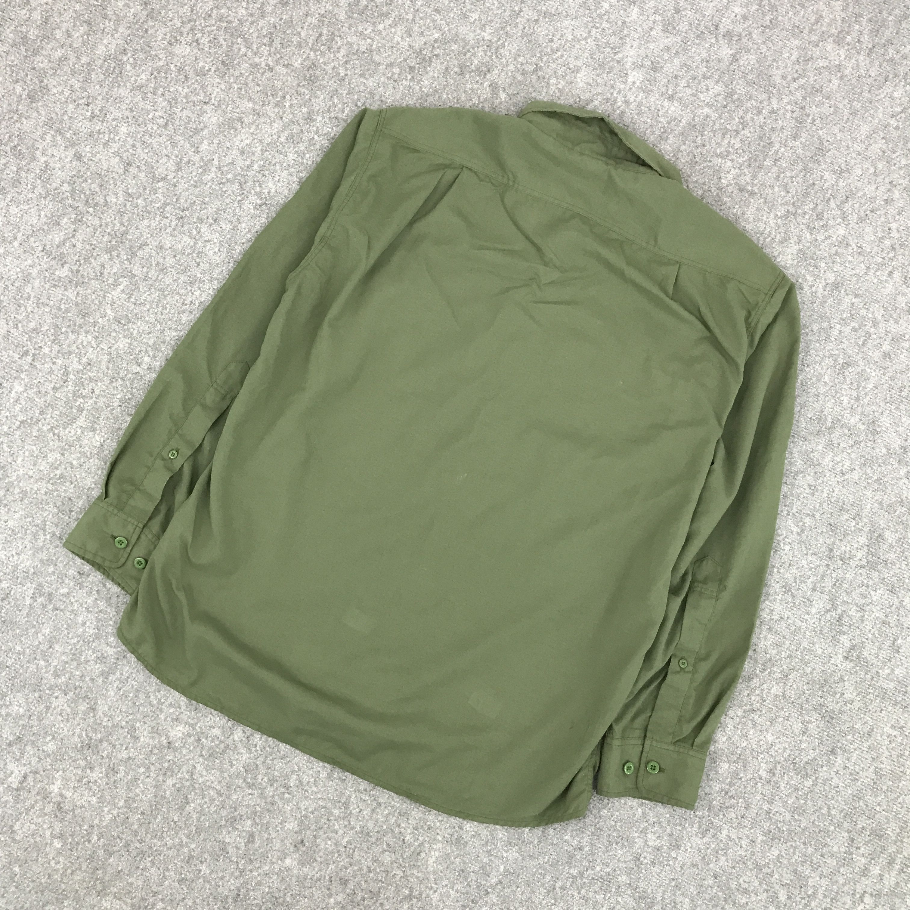 Japanese Brand × Montbell MONT-BELL OUTDOOR GREEN BRAND BUTTON UP TSHIRTS Size US L / EU 52-54 / 3 - 6 Thumbnail
