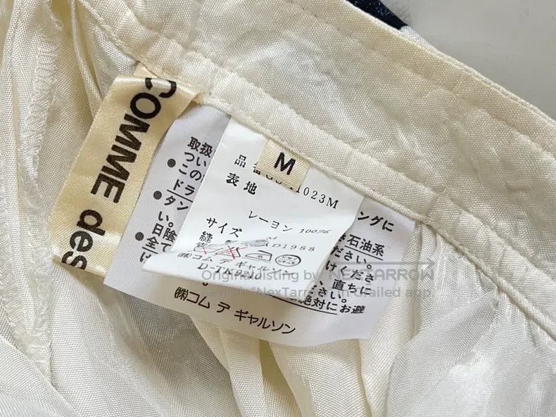 Comme Des Garcons size M Portrait printed satin skirt