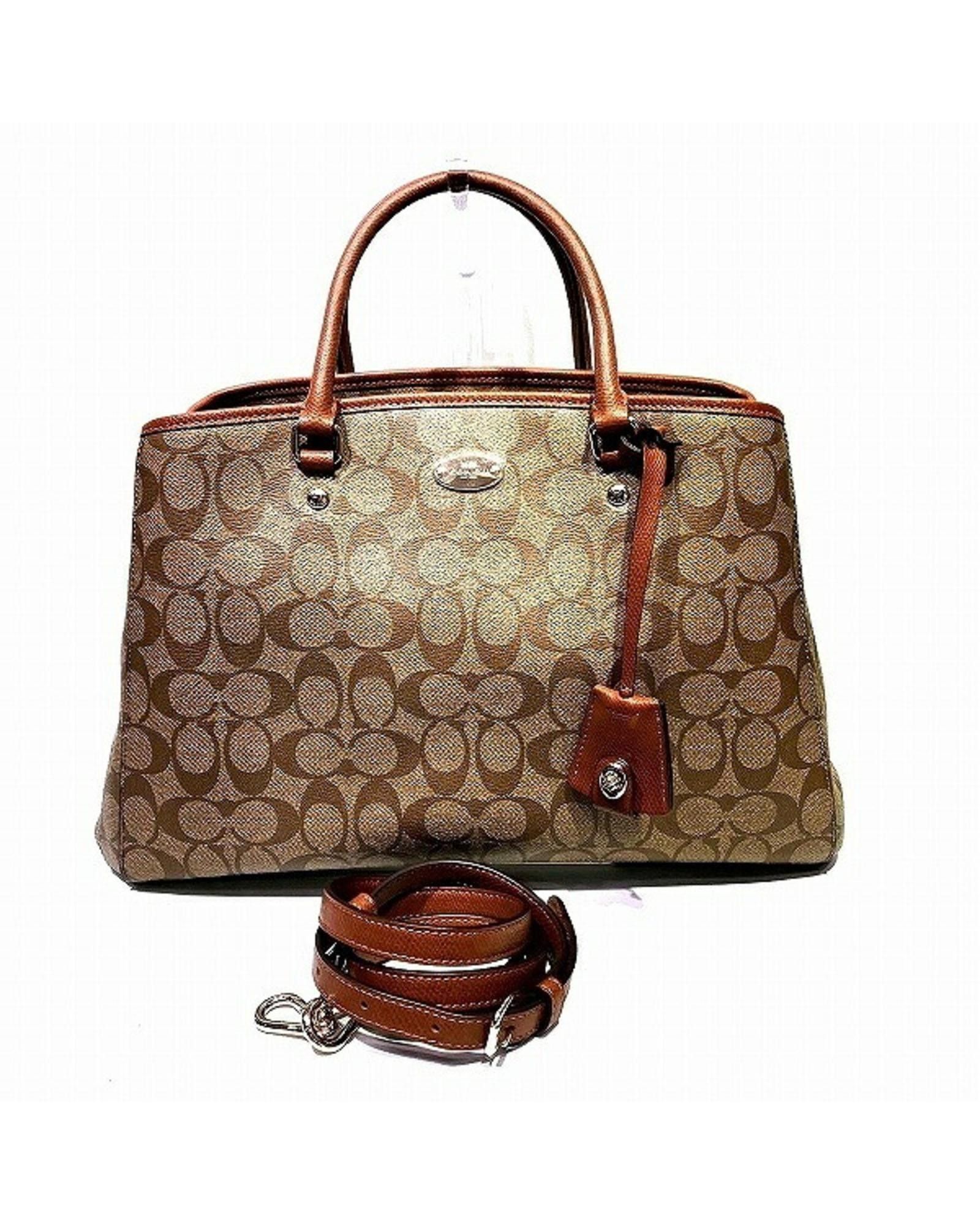 image of Coach Canvas Shoulder Handbag With Timeless Design in Brown, Women's