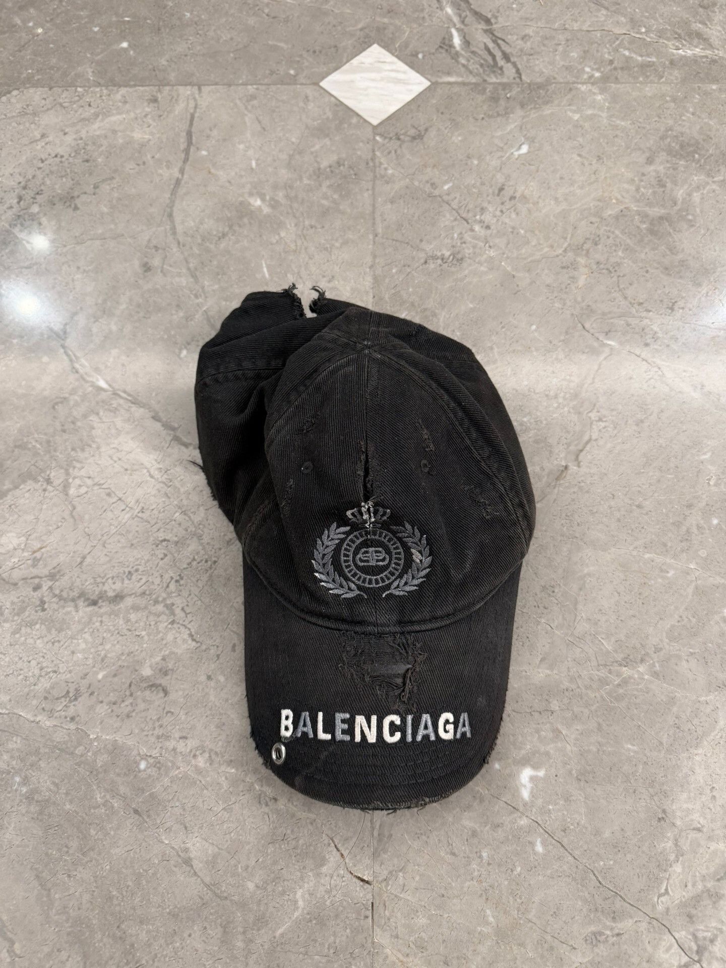 Balenciaga Balenciaga Distressed Piercing Cap | Grailed
