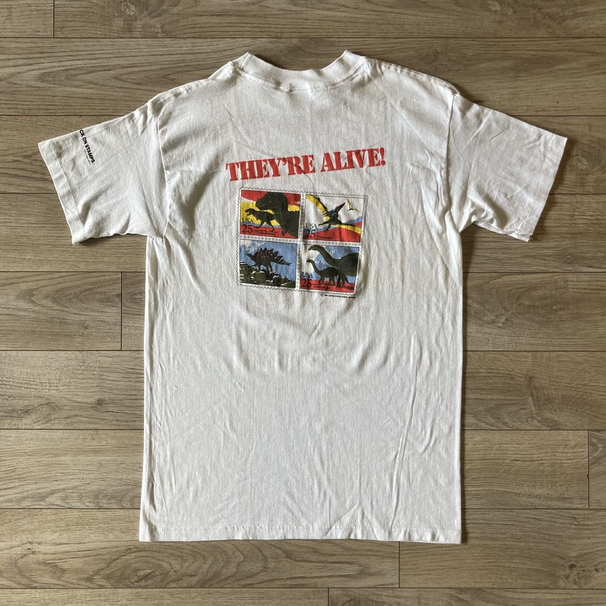Vintage 1980s How to Lick a Tyrannosaurus Rex USPS stamp promo tee Size US L / EU 52-54 / 3 - 6 Thumbnail