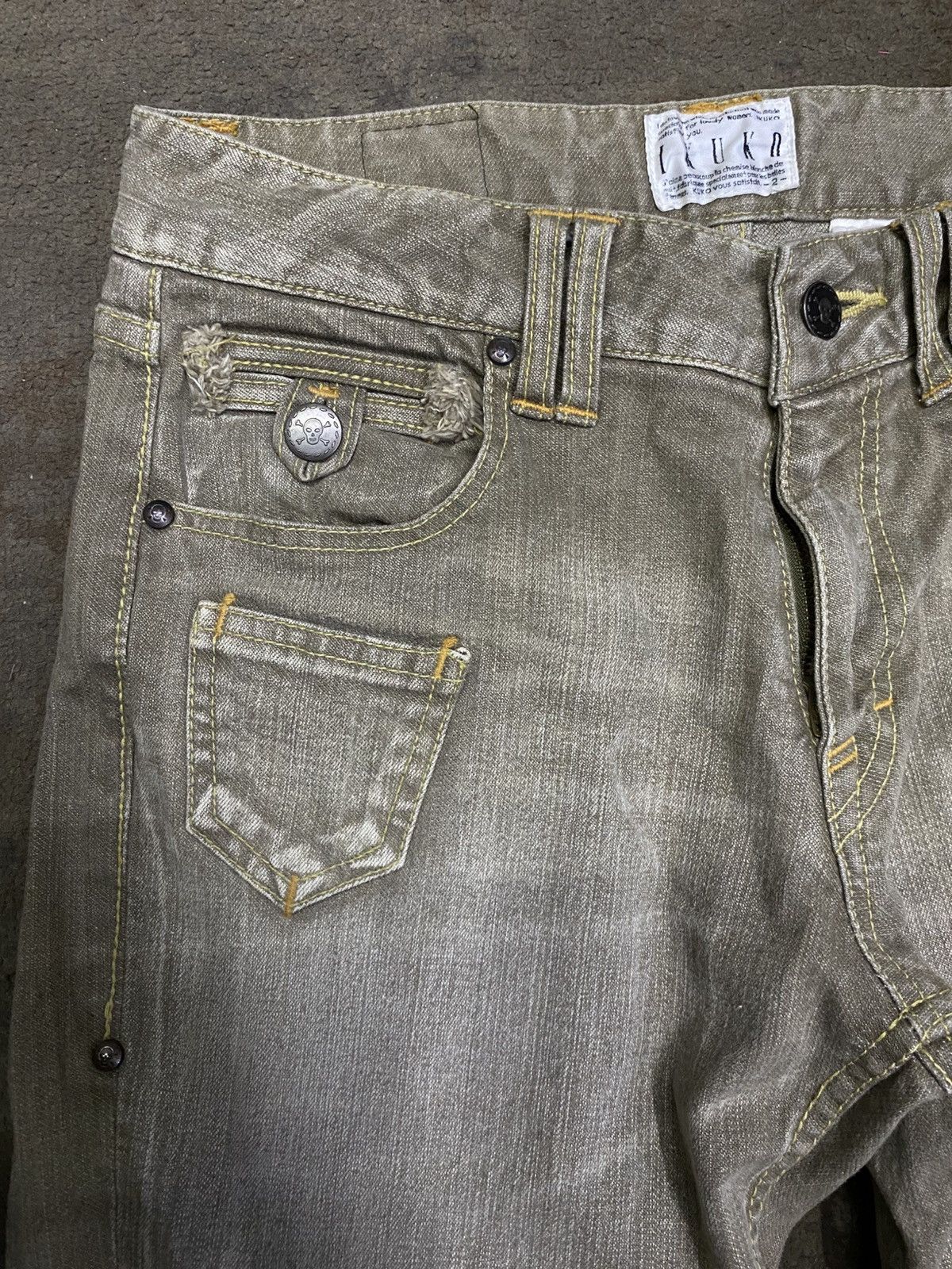 2000s kuko yous satisfait stone wash flared denim pants