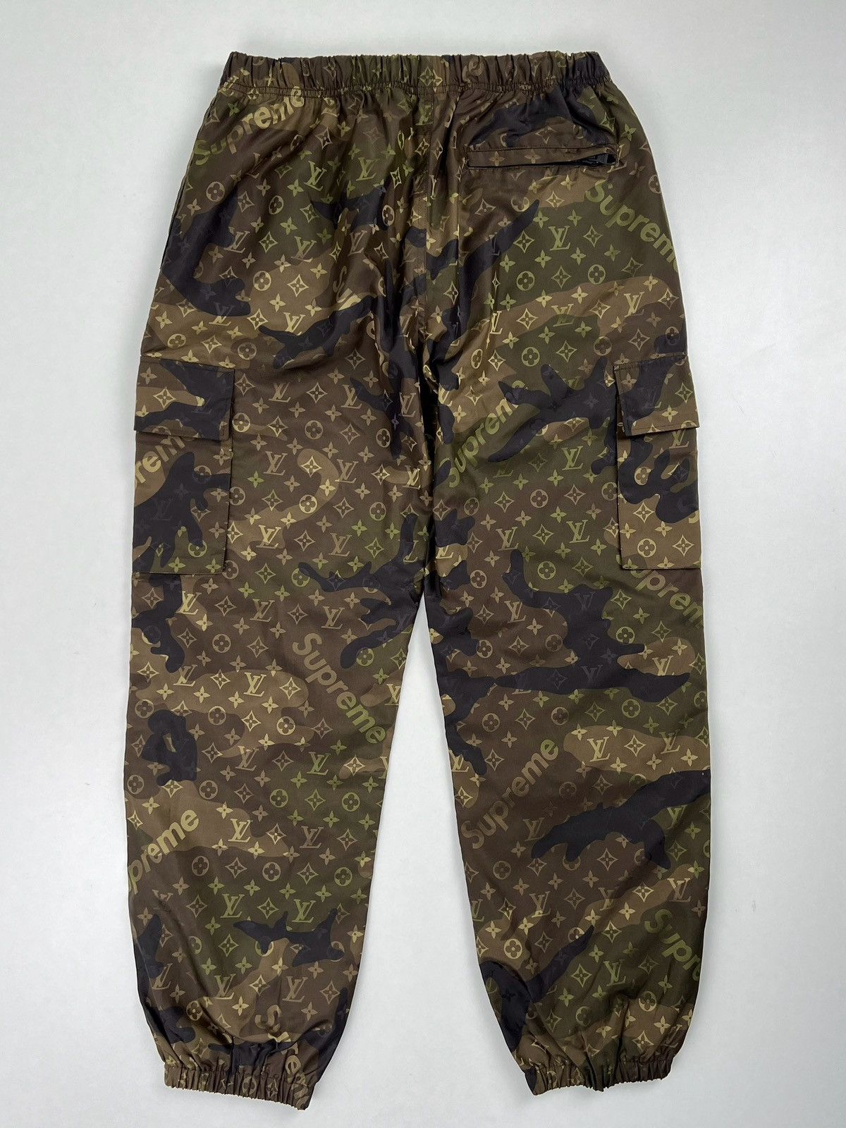 Supreme LV supreme Camo monogram nylon track pants 40 | Grailed