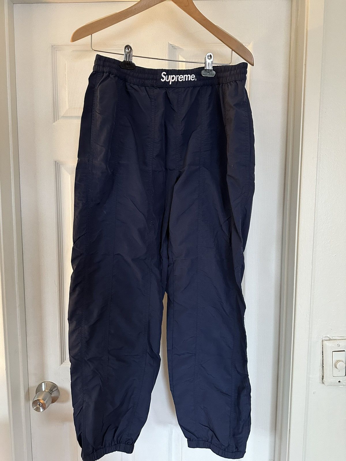 Supreme track pants sizing hotsell