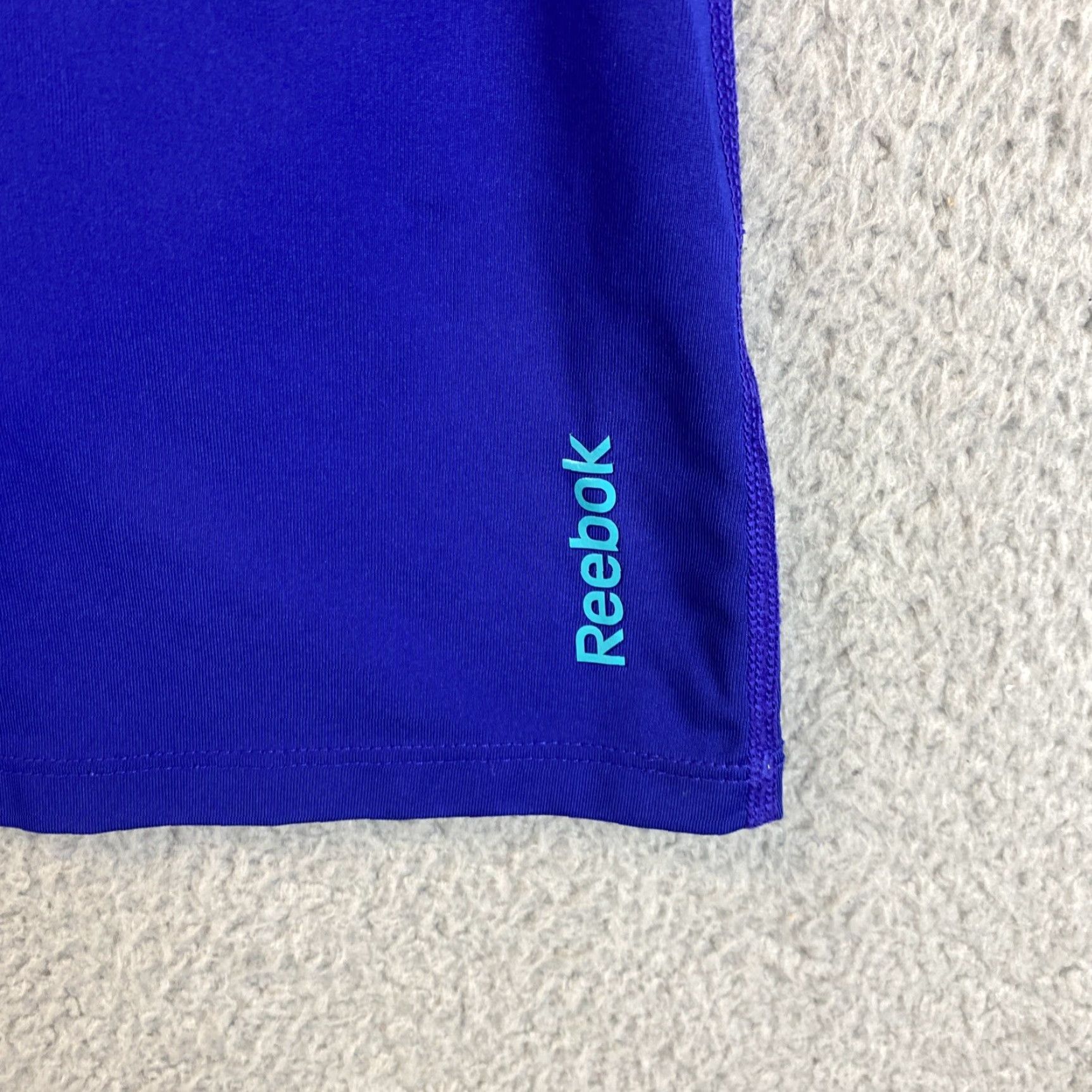 Reebok VINTAGE? No. Reebok Women’s Blue Short Sleeve T Shirt XL Regular Crew Neck Breathable Lightweight Logo 96% Polyester 4% Spandex Casual Sports 69-17 Size XL / US 12-14 / IT 48-50 - 5 Thumbnail