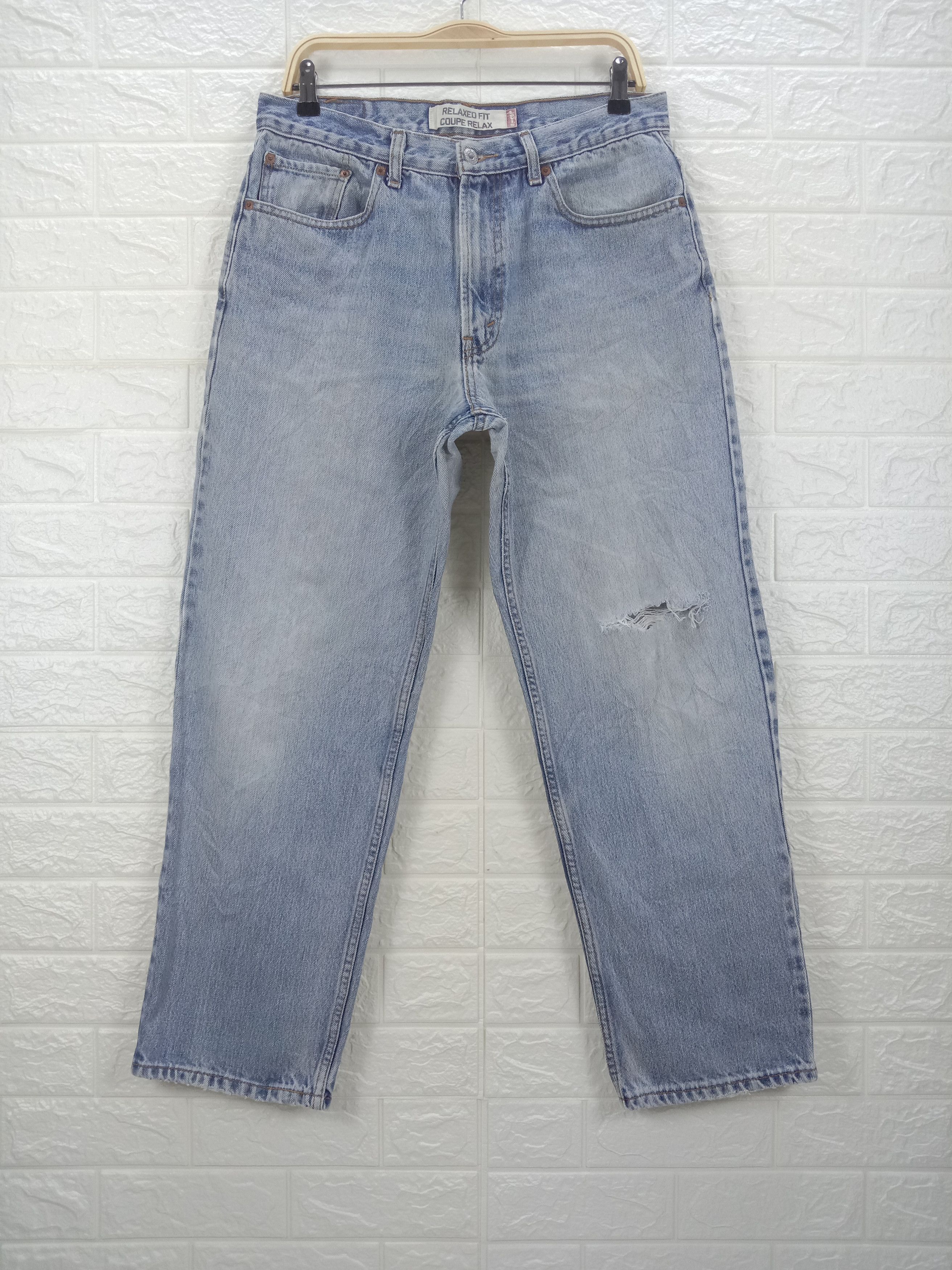 image of Distressed Denim x Levis Vintage Levi's 550 Light Wash Jeans Relaxed Fit Denim, Men's (Size 33)