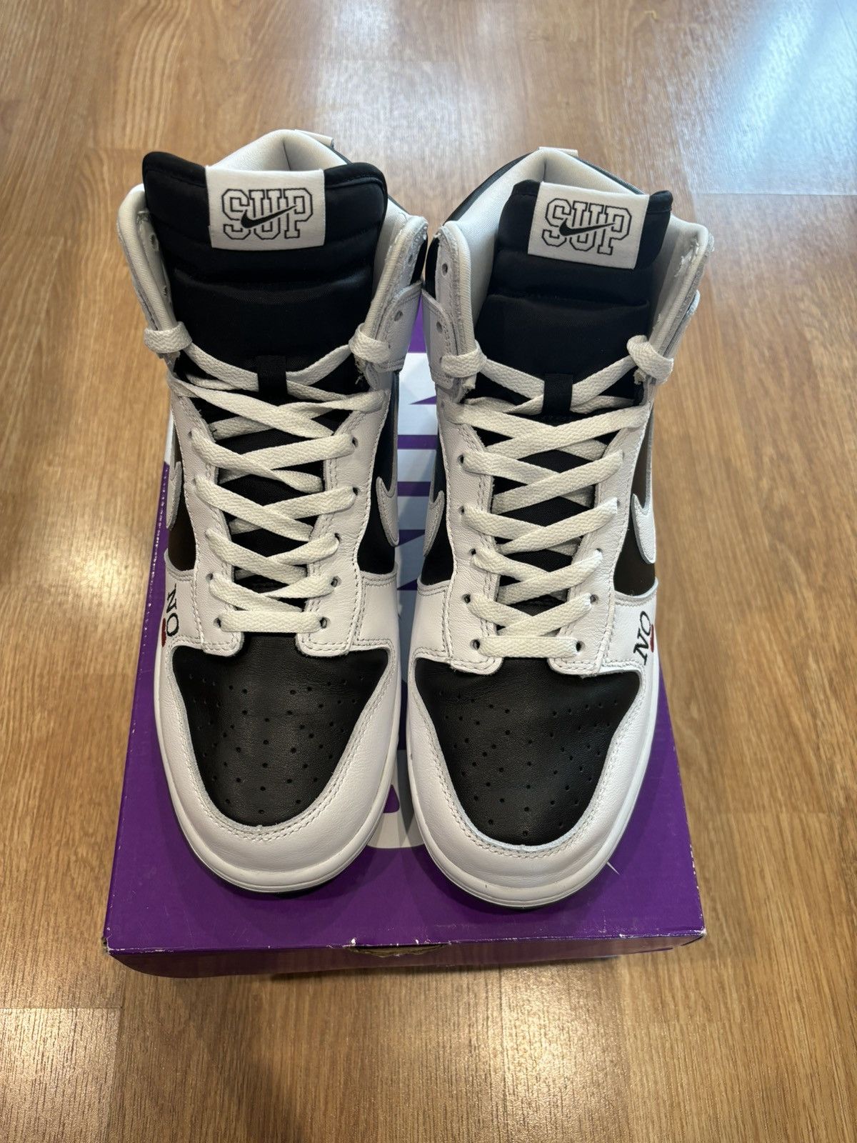 image of Nike Sb By Any Means Dunks Shoes in White, Men's (Size 10)