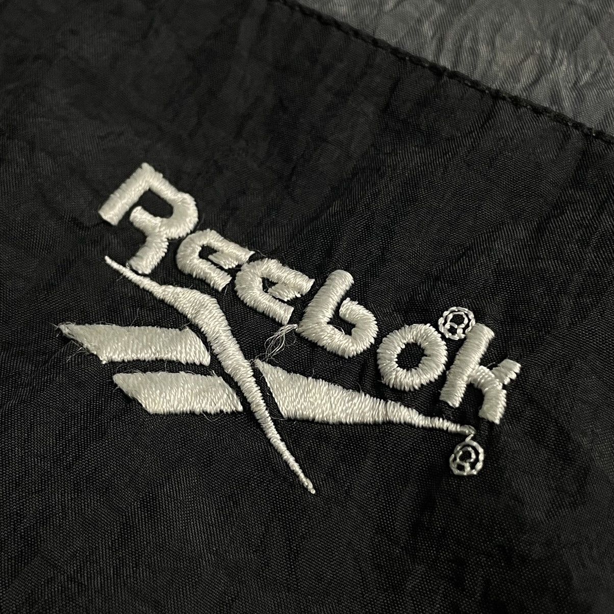 Reebok × Vintage VINTAGE REEBOK EMBROIDERED SPELL OUT WINDBREAKER JACKET Size US L / EU 52-54 / 3 - 7 Thumbnail